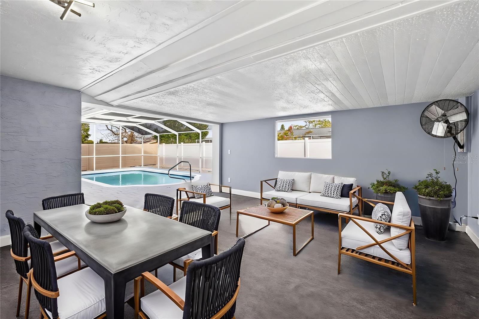 AREA FOR RELAXATION WITH INSTALLED FANS FOR EXTRA BREEZE *VIRTUALLY STAGED*