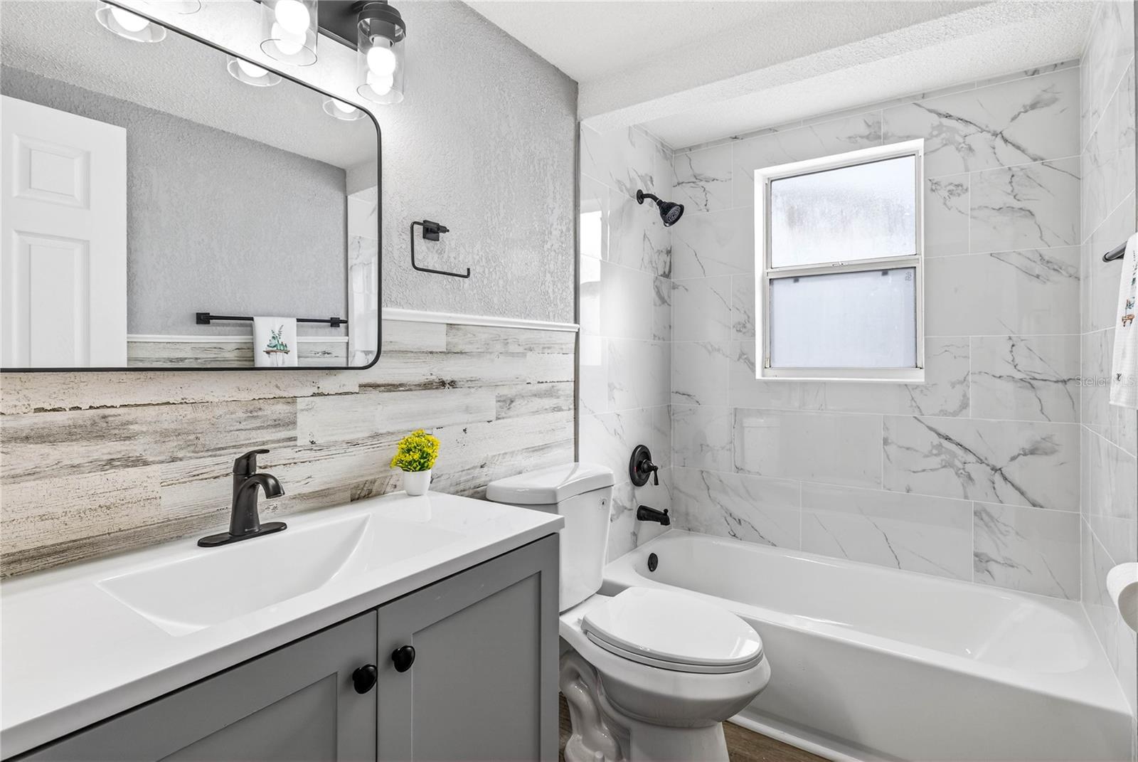 FULLY REMODELED HALL BATHROOM