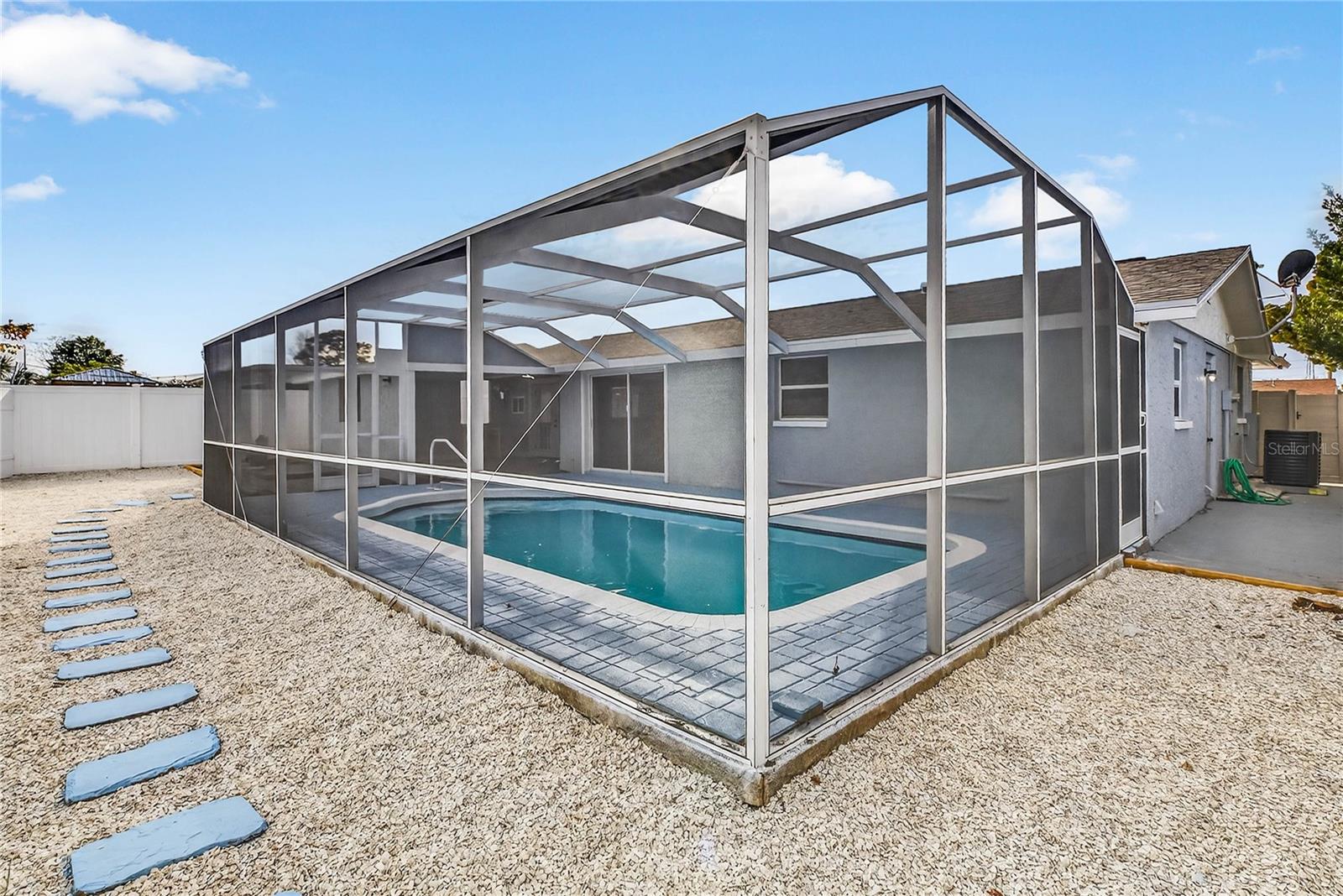 MAINTENANCE-FREE BACK YARD WITH VINYL PRIVACY FENCE