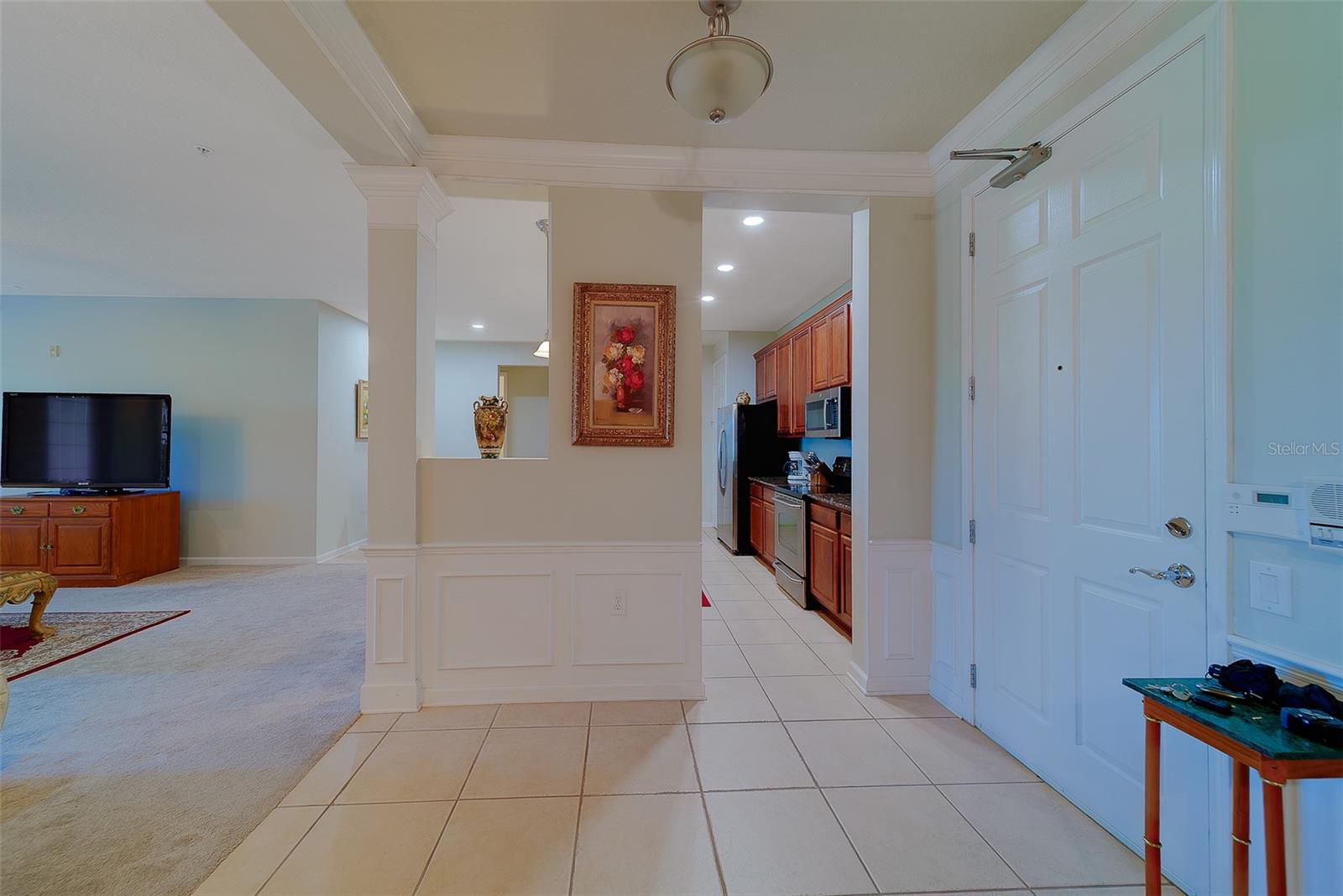 Inside Foyer to the left is the Kitchen