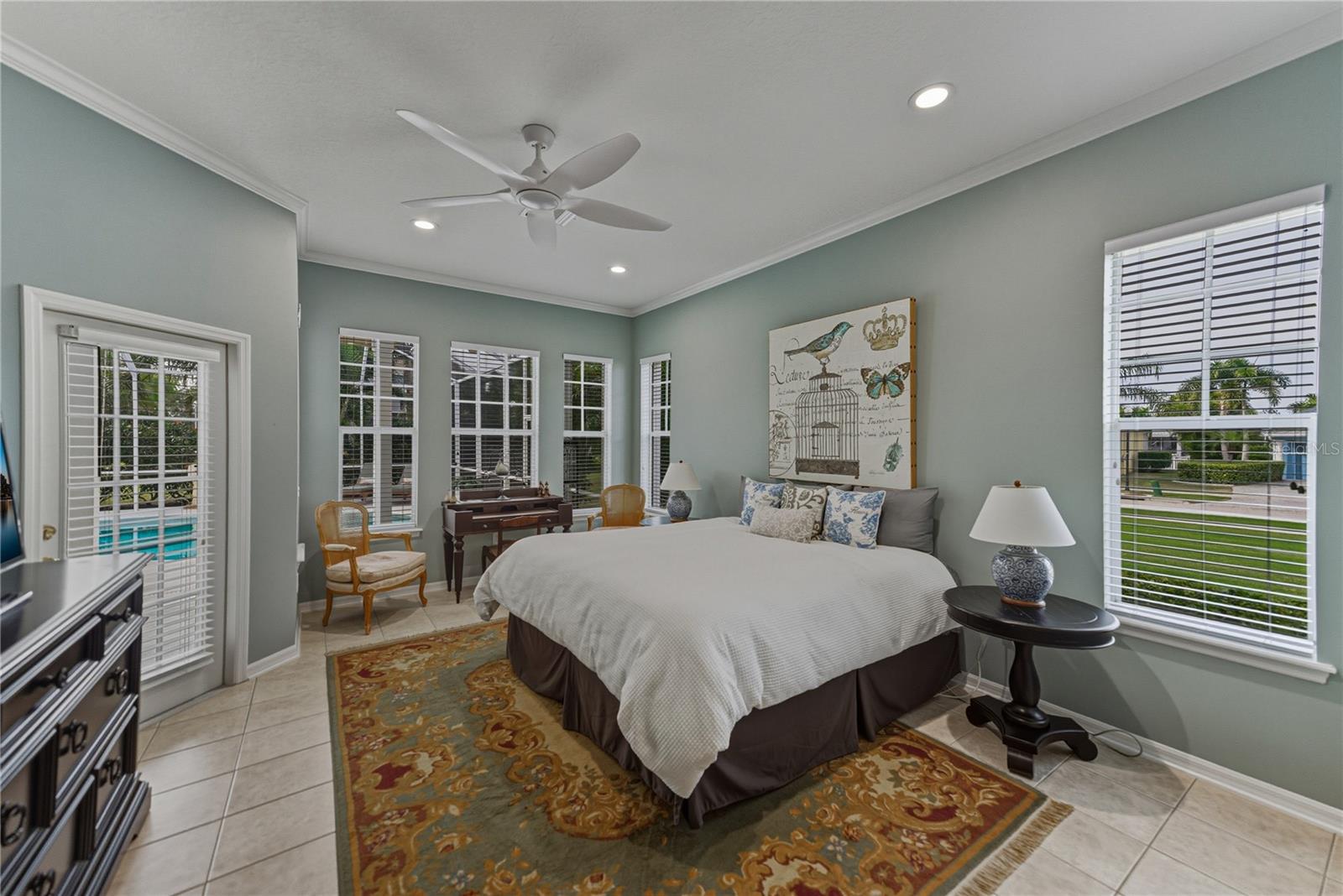 Primary bedroom with french doors to lanai