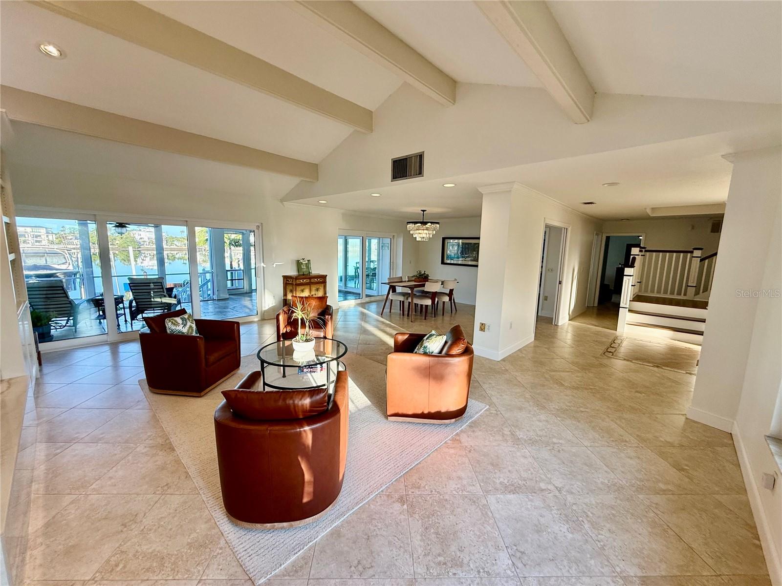 Light and comfy formal living room, with wood burn fireplace