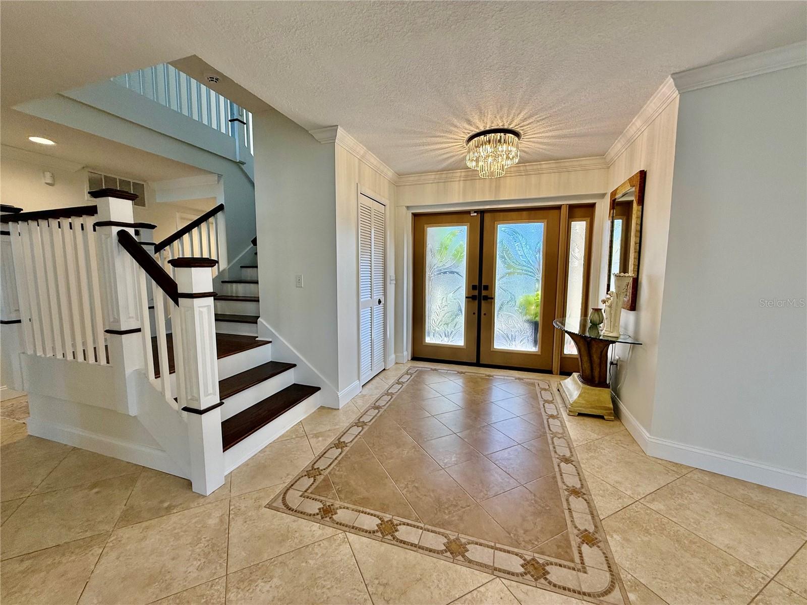 Stained Wood, Custom finished,  stairs and rails, lead to spacious upper level