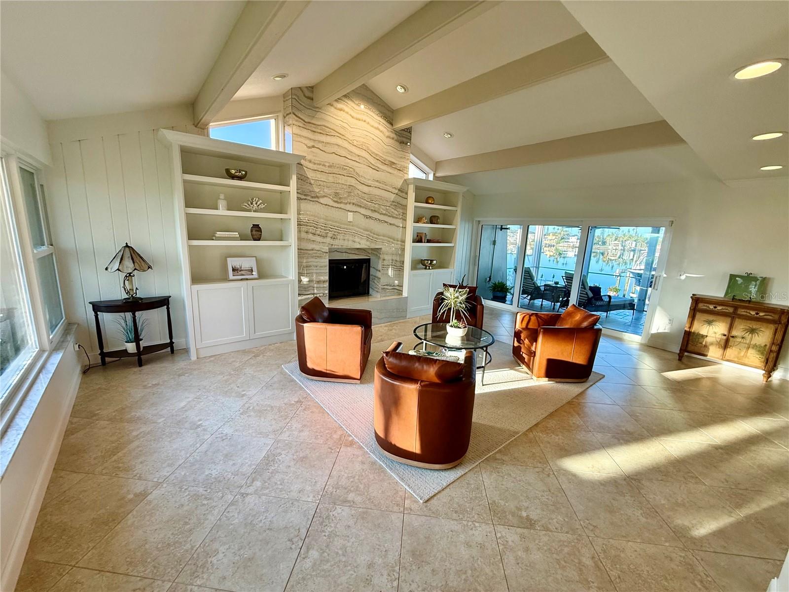 Open space living room, with an abundance of natural light.