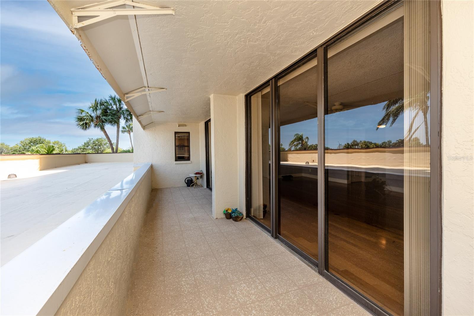Extra long double balcony. Please note, the area beyond the balcony is the roof of the portico and not accessible by the owner/tenant.
