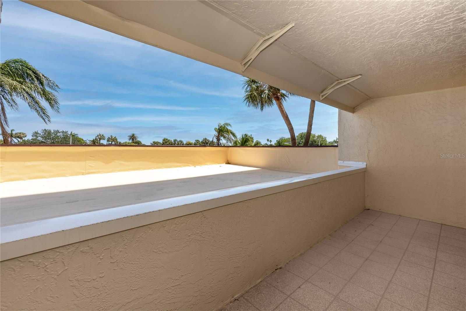 This condo comes with two generous balconies! Please note, the space beyond the balcony is the roof of the portico and cannot be accessed by the owner/tenant.