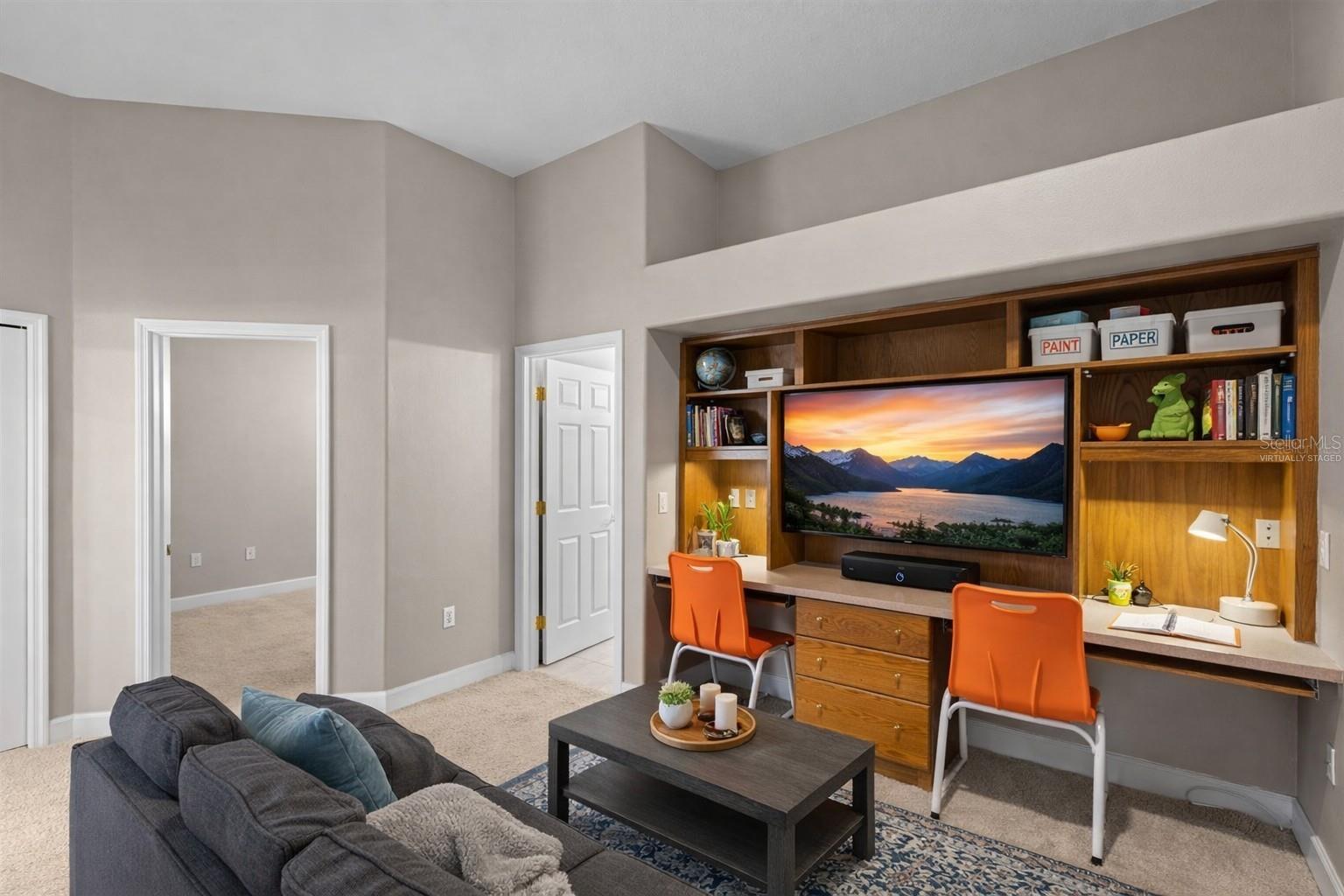 Virtually staged option 2 homework tv room