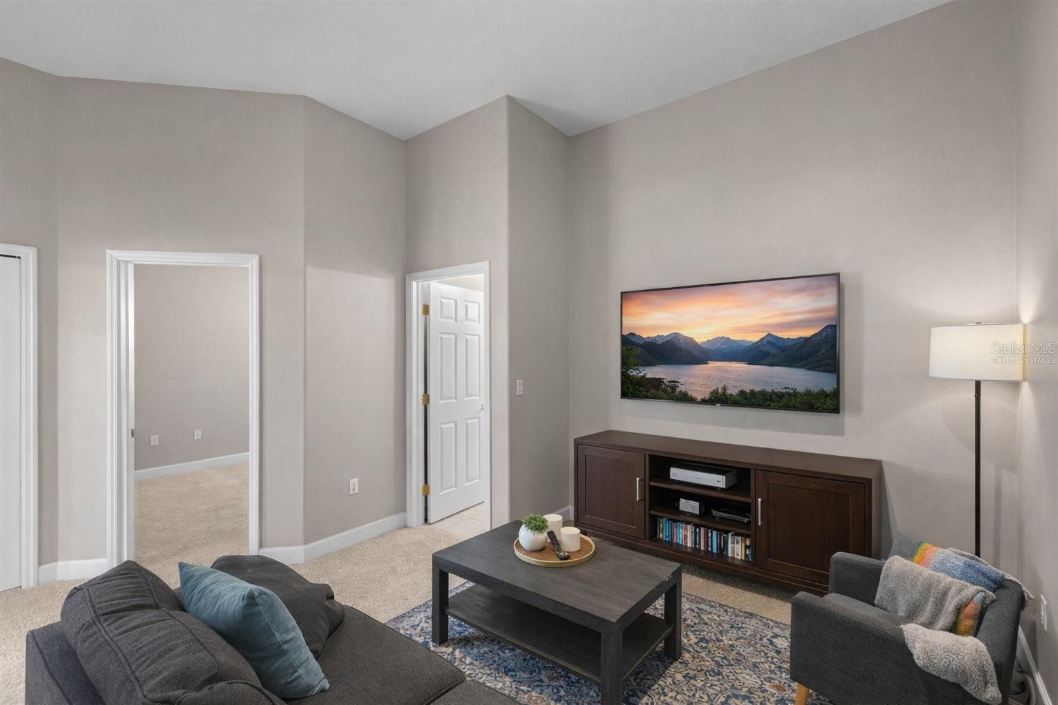 Virtually staged option 3 additional tv room