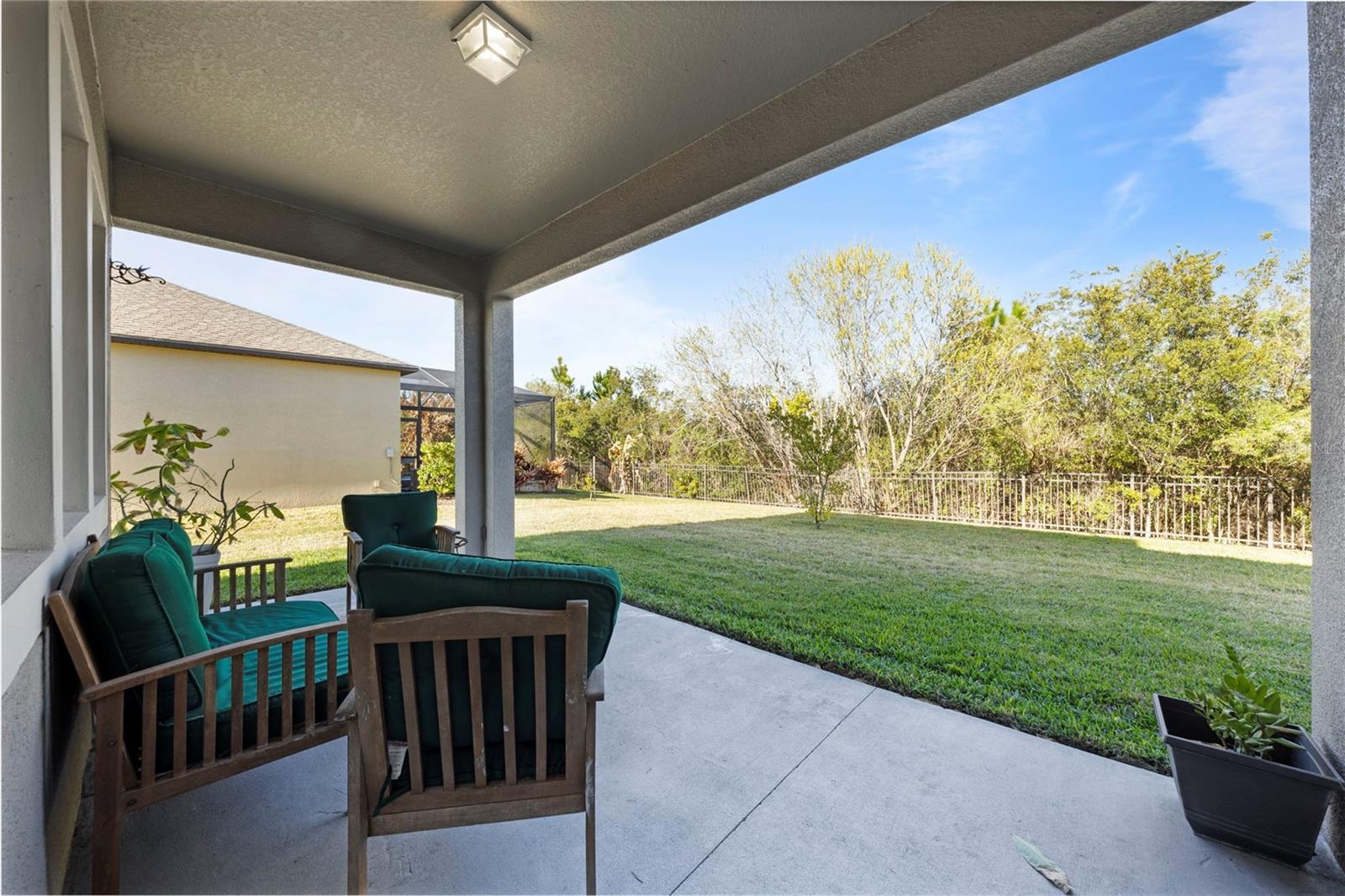 Covered back patio with conservation views - no rear neighbors!