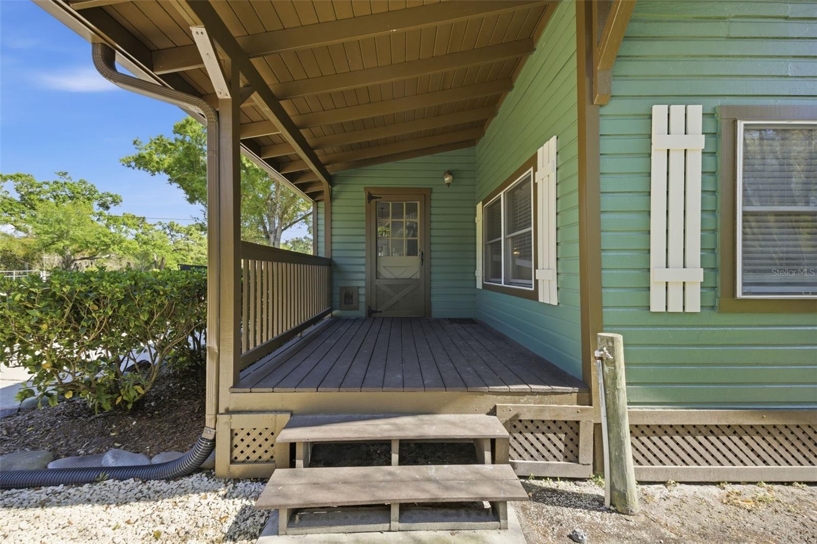 Side Porch off the kitchen toward 3 Car garage