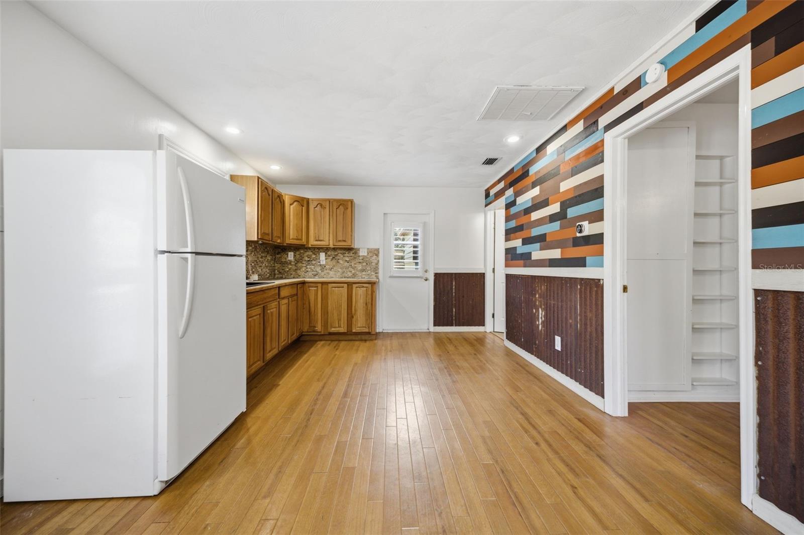 In Law Suite with custom woodworking farmhouse walls