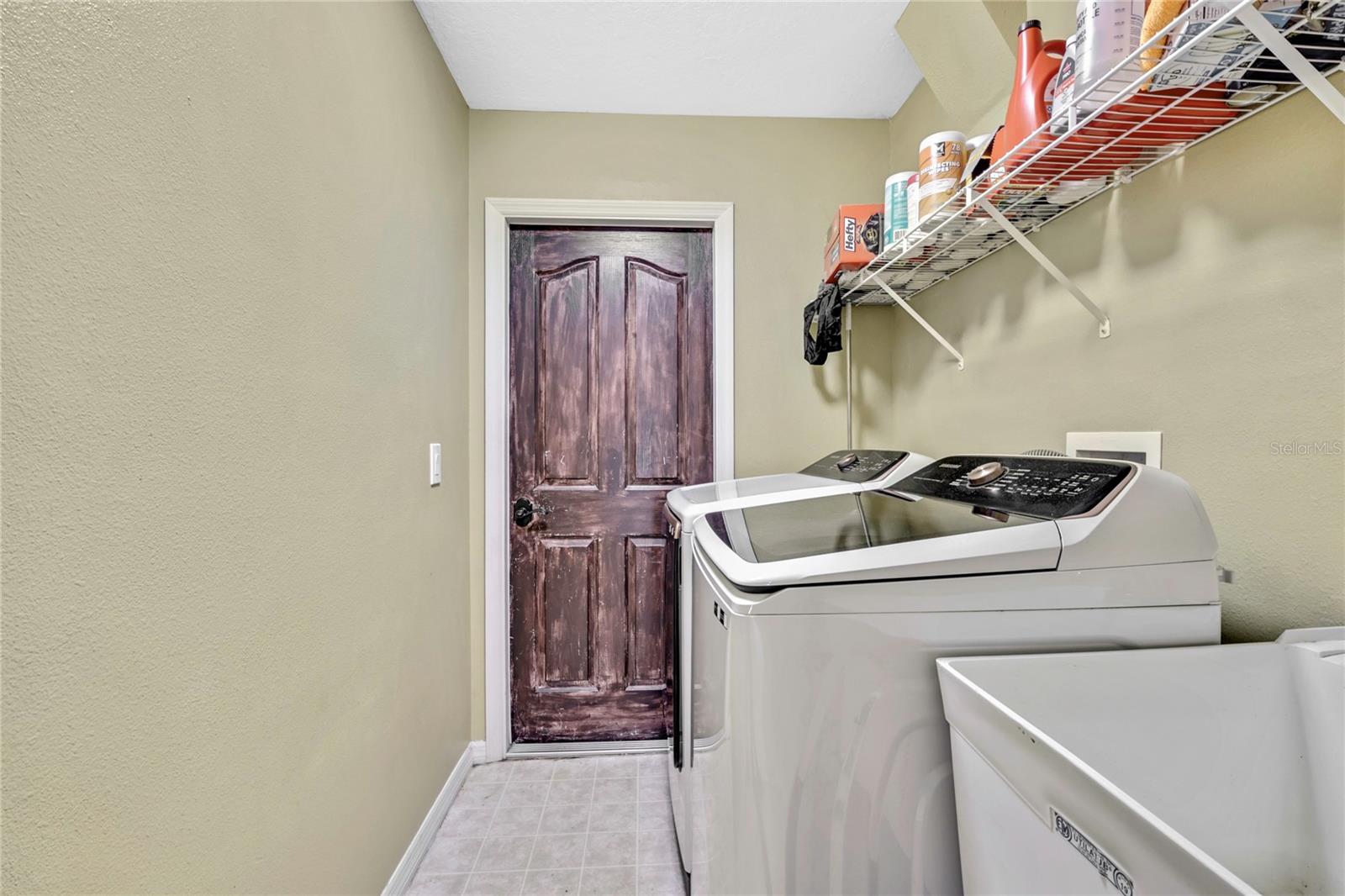 laundry room and door to house garage