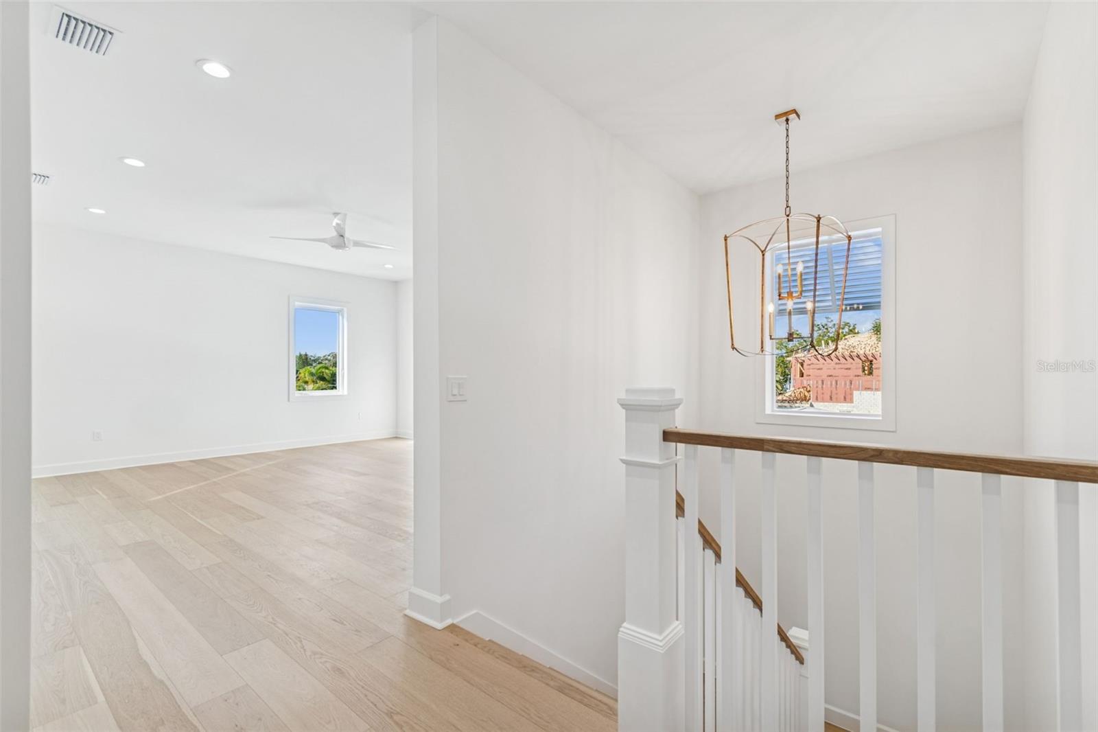 Upstairs foyer looking into bonus room