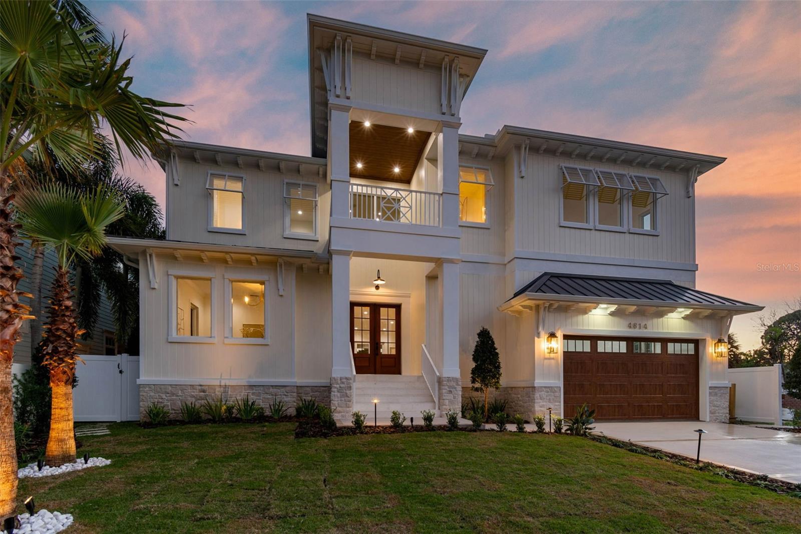 Exterior with 20' entry and double wood doors