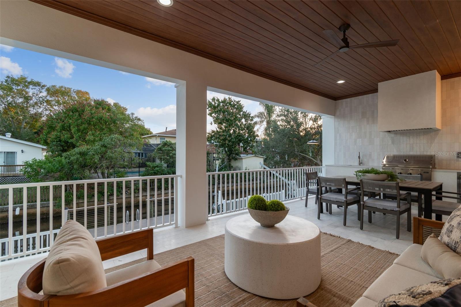 Lanai overlooking pool and dock