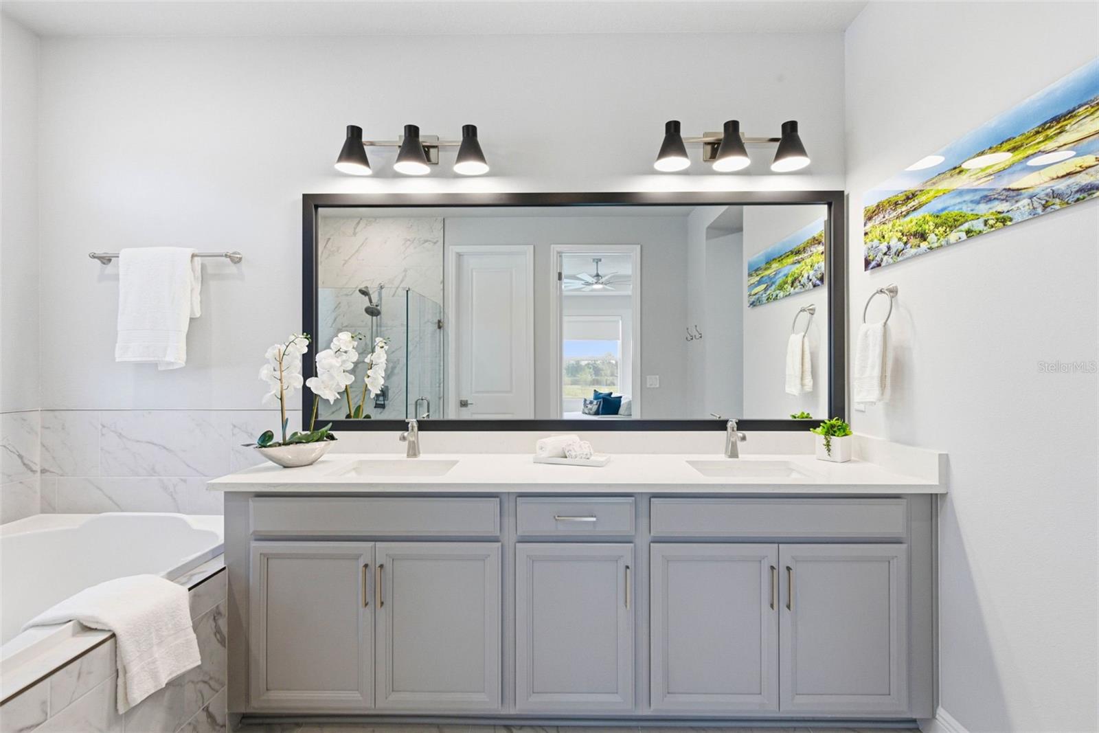 Primary En-suite Bathroom. Quartz Counter Tops