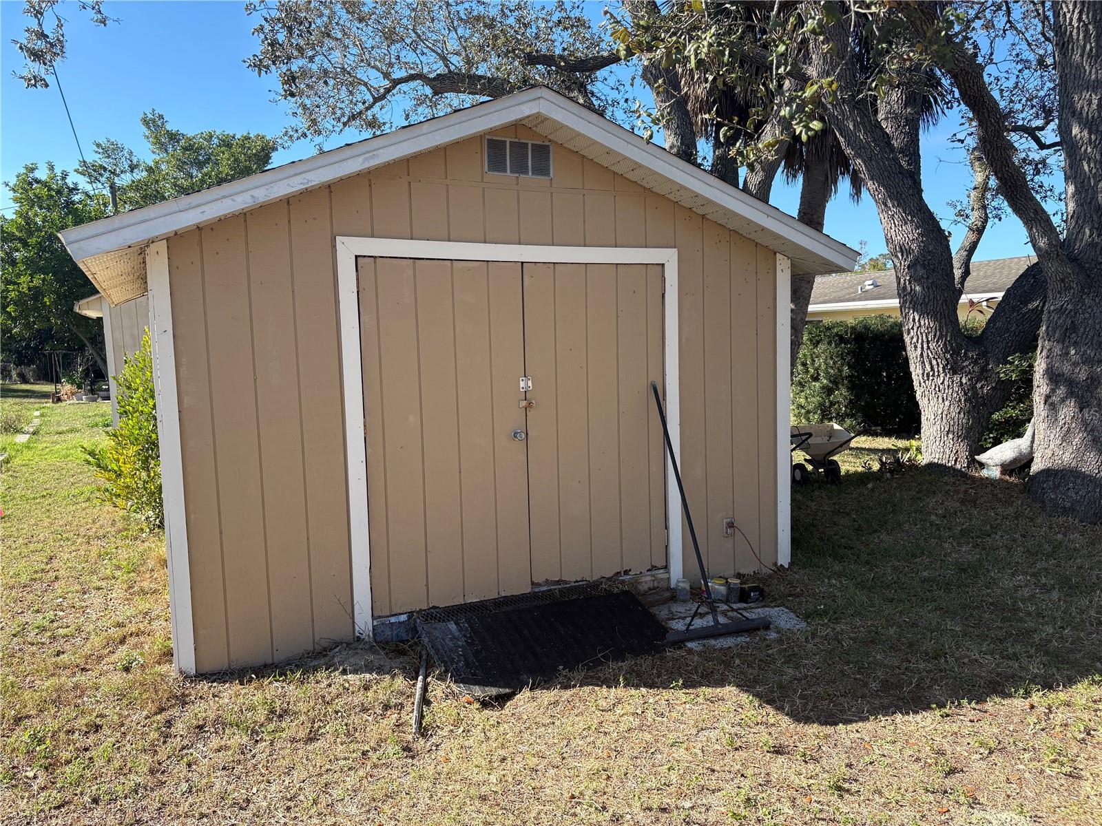 Shed in back yard with electric.
