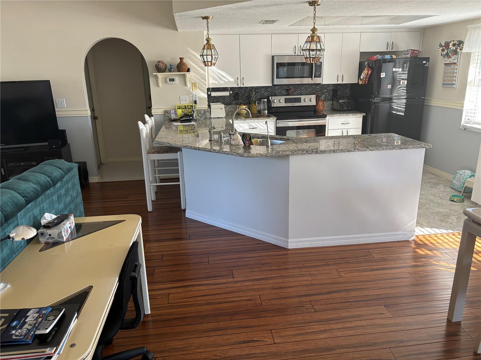 Dining area looking toward kitchen.