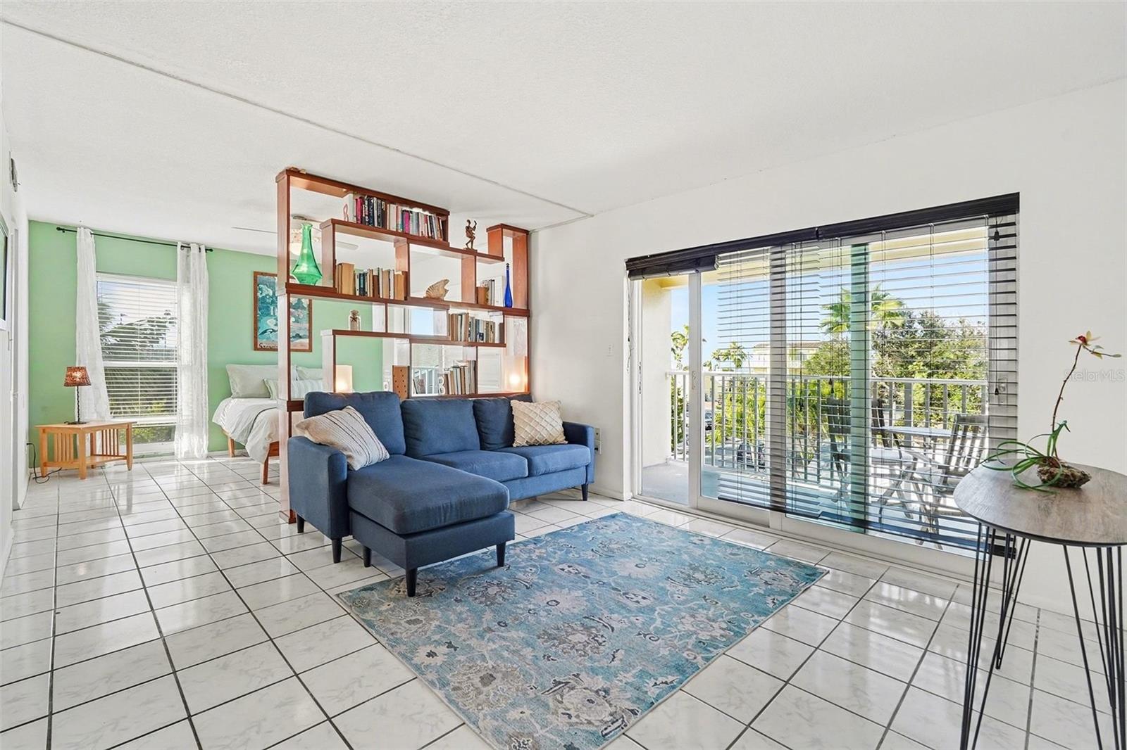 Light and bright with a custom built in bookshelf for separation.