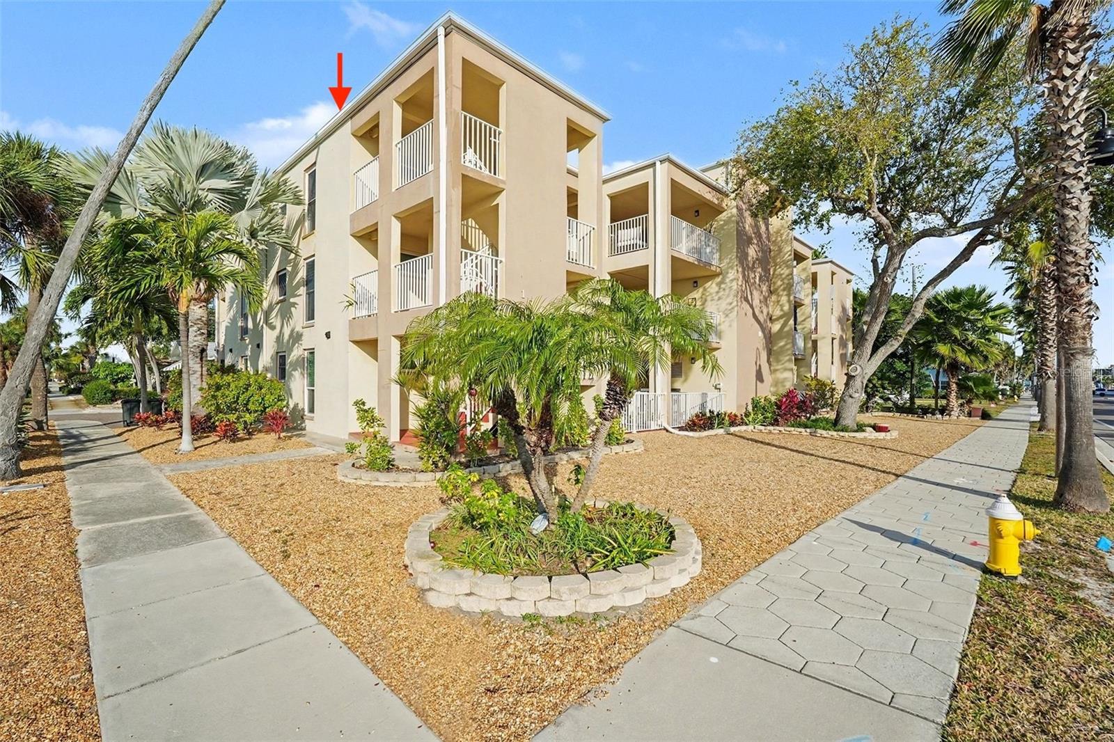 Top floor end unit with front sitting area.