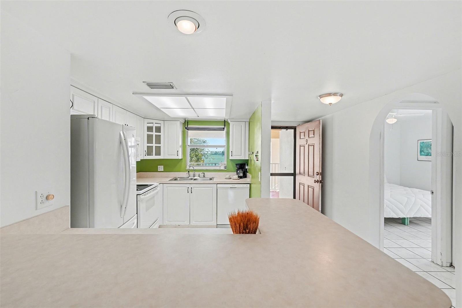 Bedroom one is located just off of the kitchen at the front of the building.