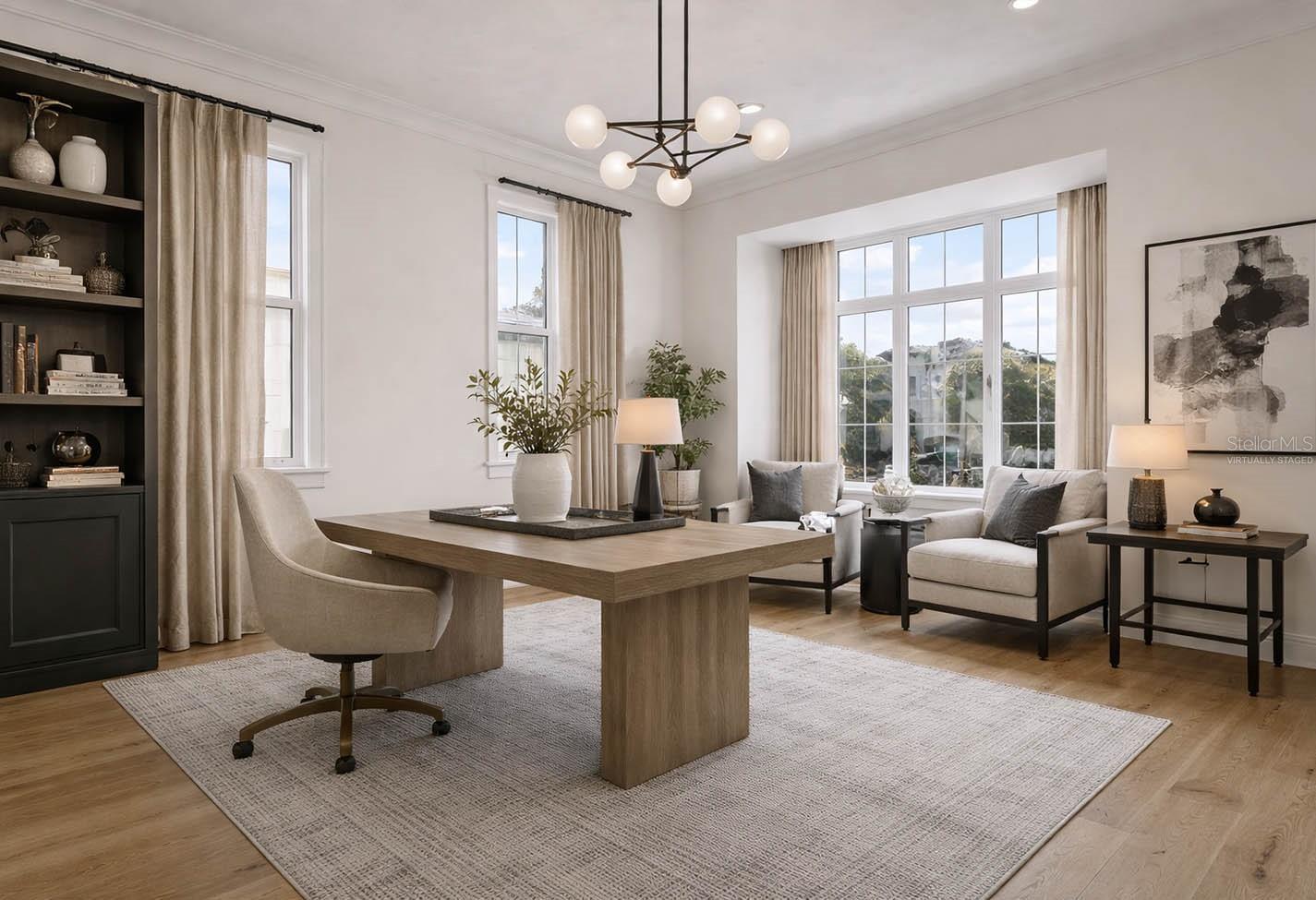 OFFICE/LIVING ROOM. CAN DOUBLE DUTY AS FIFTH BEDROOM WITH FULL BATH AND FITTED  DRESSING AREA  Virtually staged