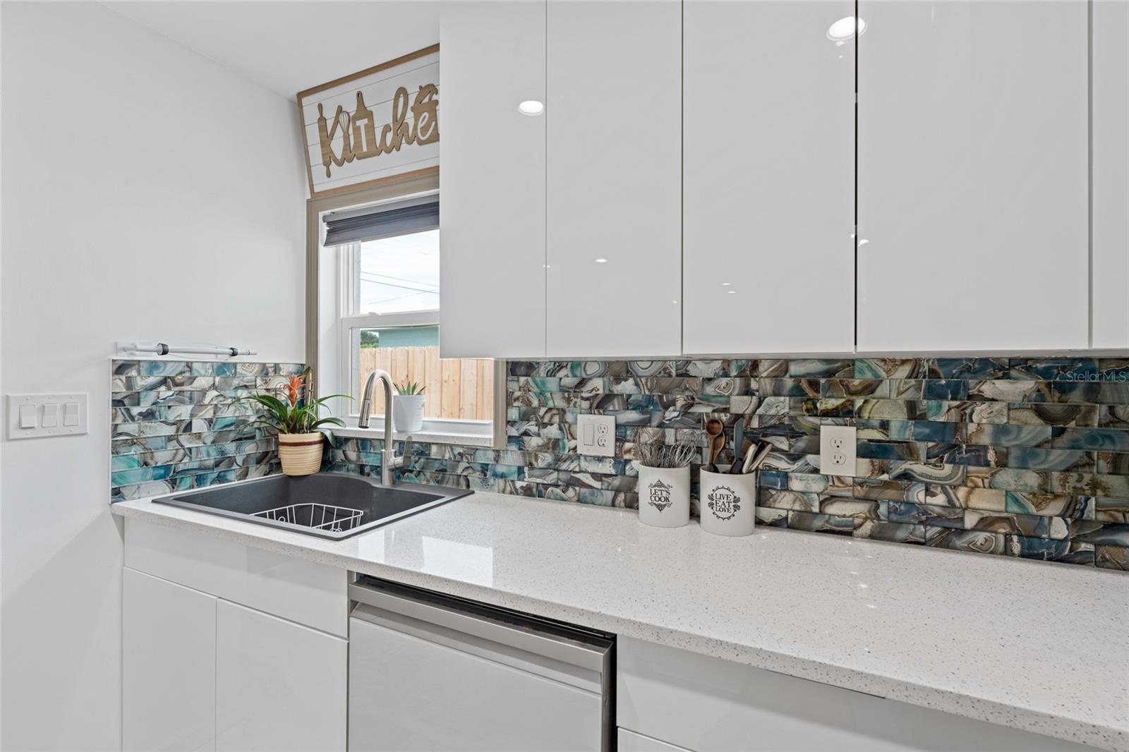 new backsplash and cabinets