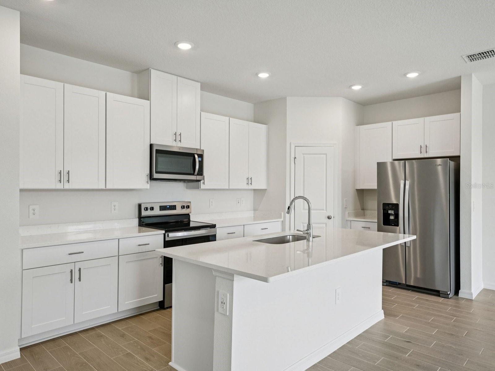 Interior photos are not of the actual home but are photos of the builder home with the same floorplan with similar interior finishes and features.