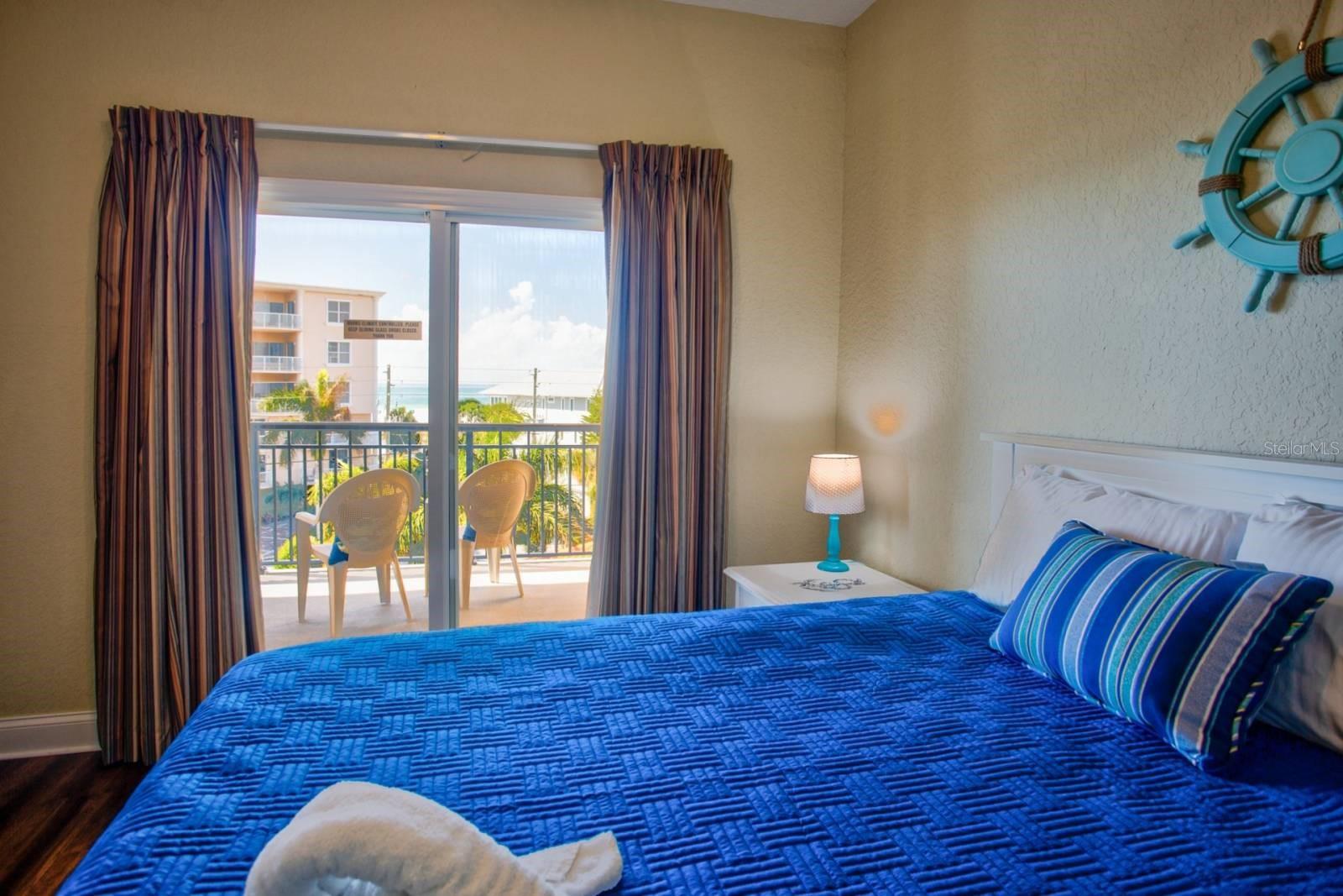 Bedroom 2 with balcony access,