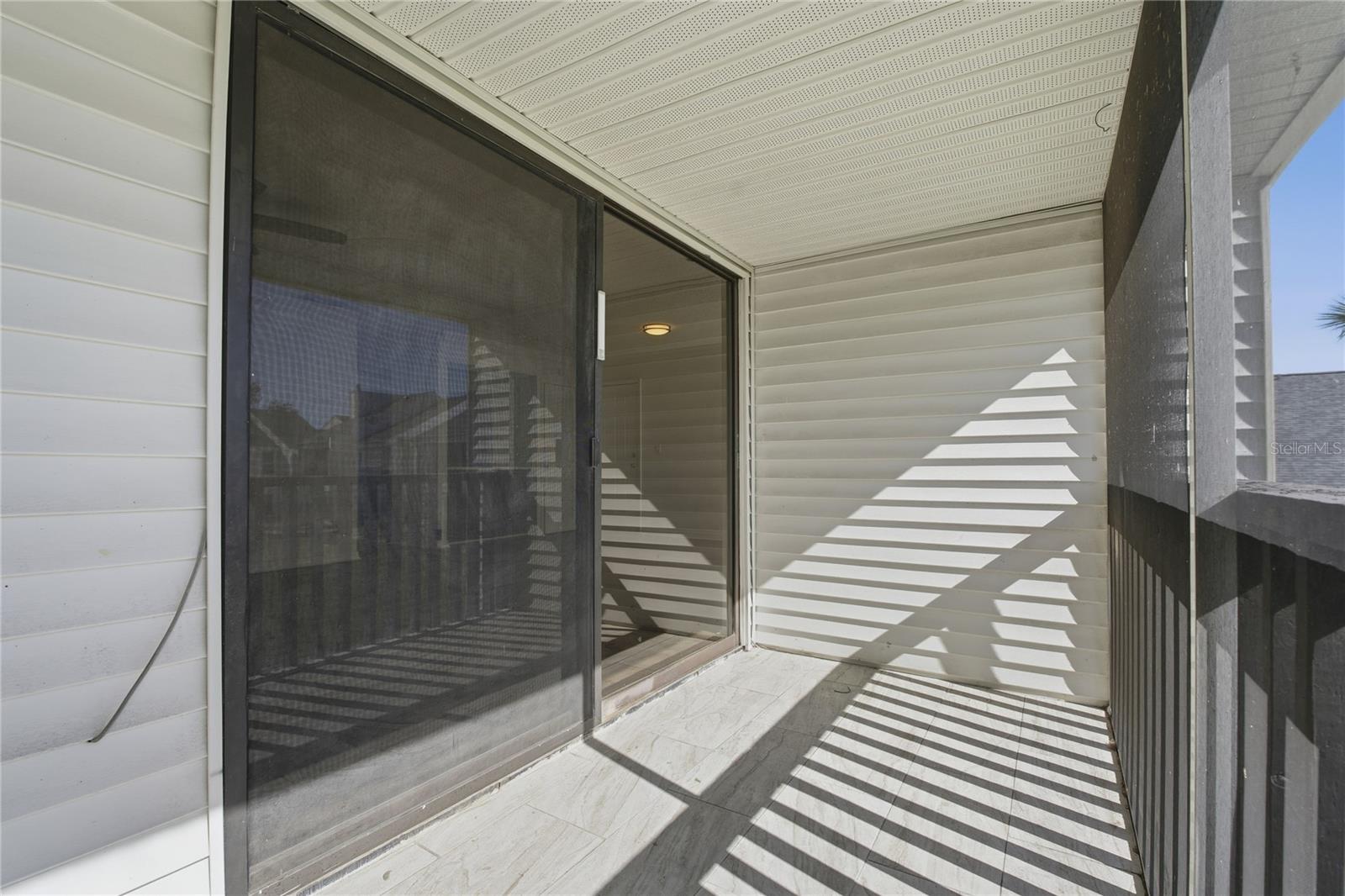 SLIDING DOORS, SCREENED IN AND COVERED PATIO