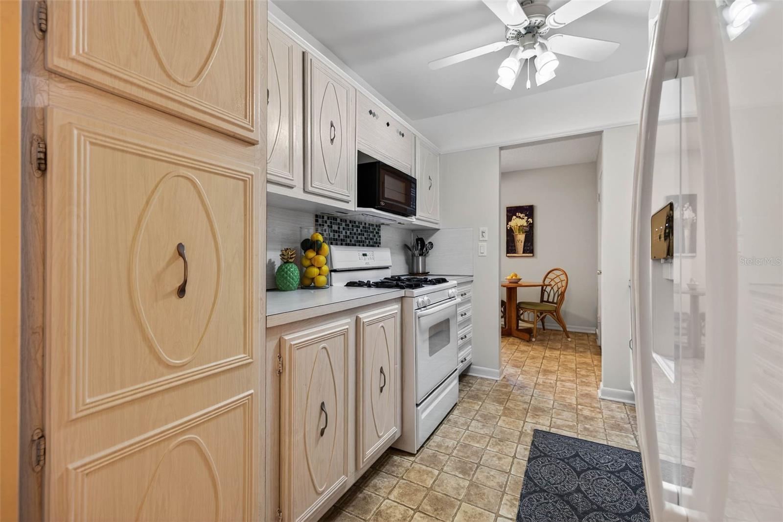 The cabinets are white the picture does not depict that