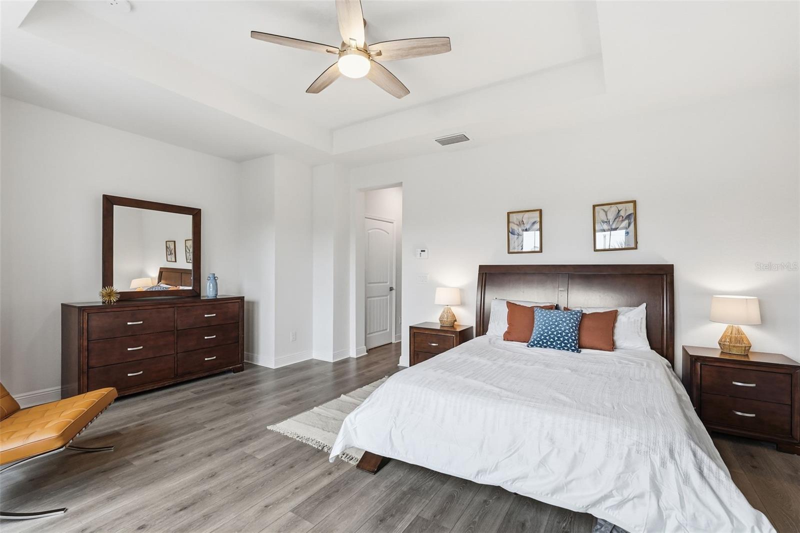 Spacious primary master bedroom suite.