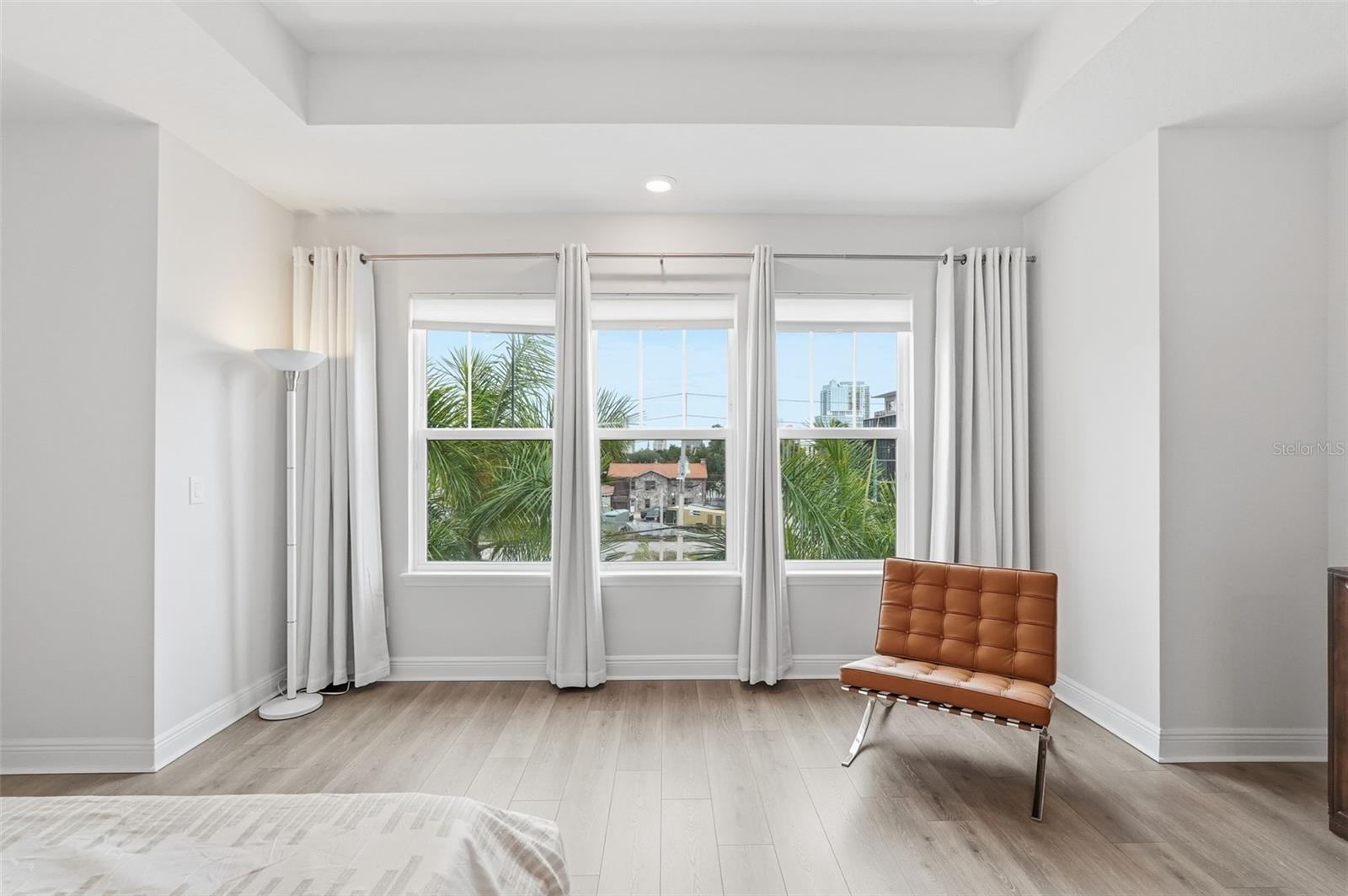Master bedroom suite with city views.
