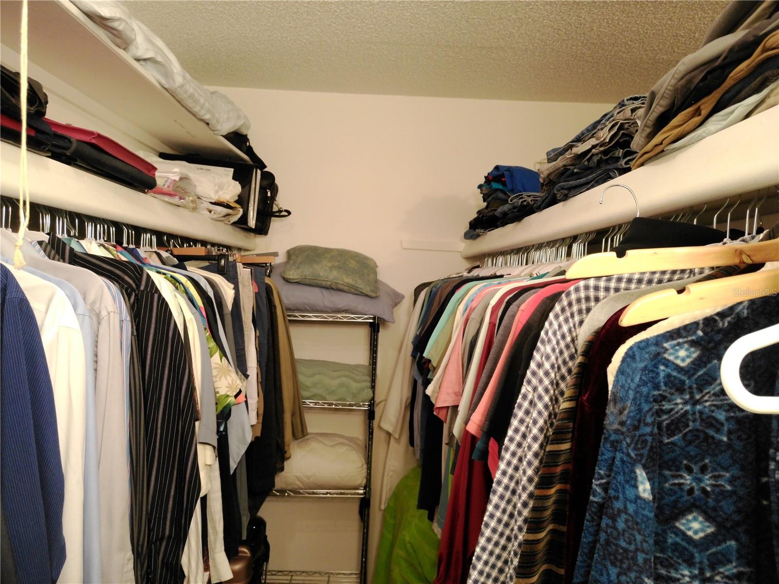 The other side of the expansive walk-in closet