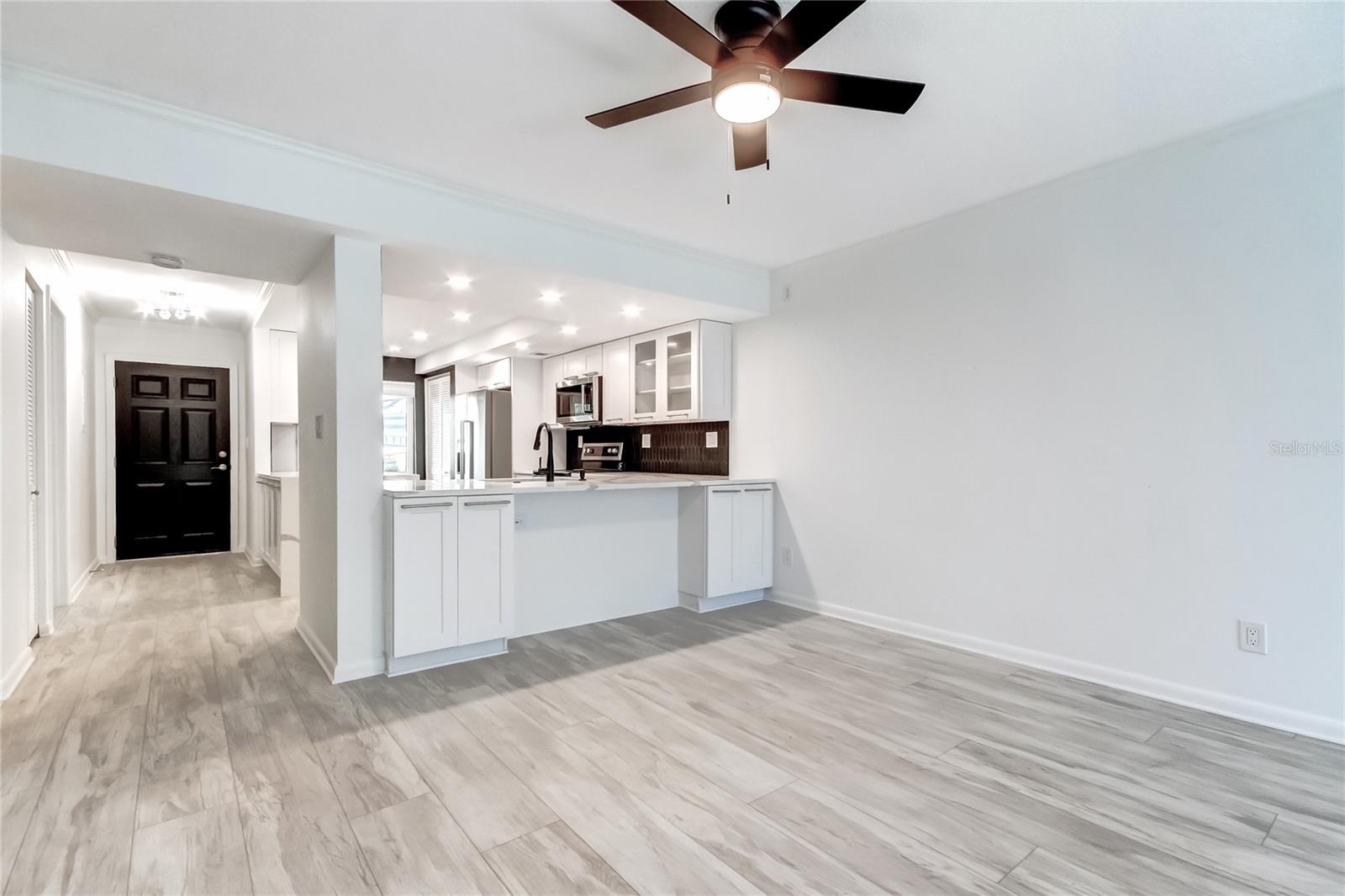 Chef's kitchen, dining and living area.