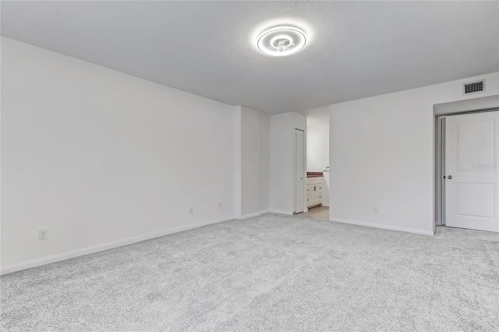 Master bedroom with ensuite and walk-in closet.
