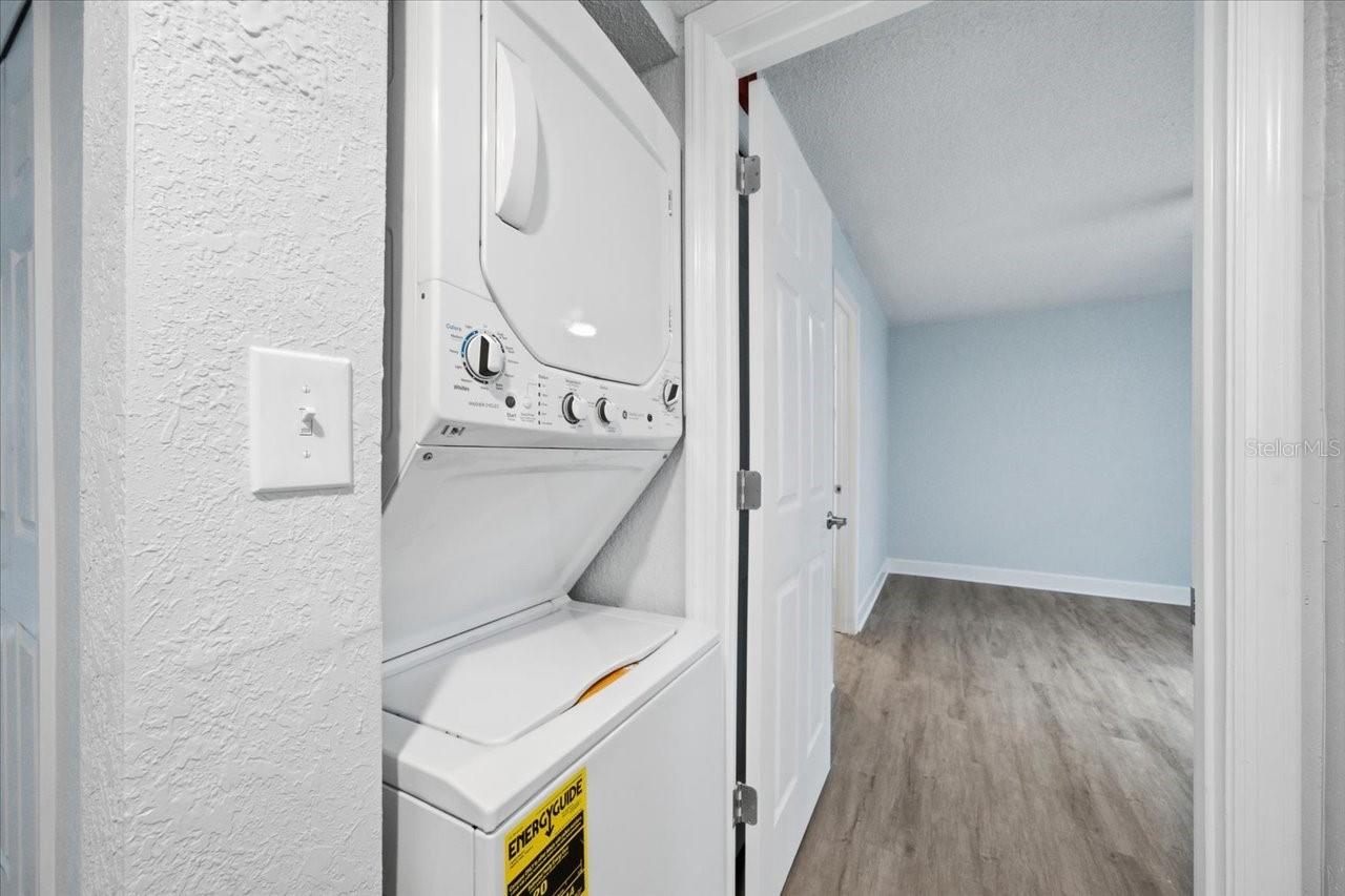 Laundry closet in hall
