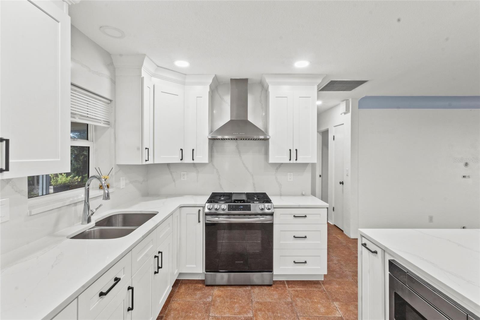 Bright, functional workspace with modern finishes, ample storage, and clean contemporary design.