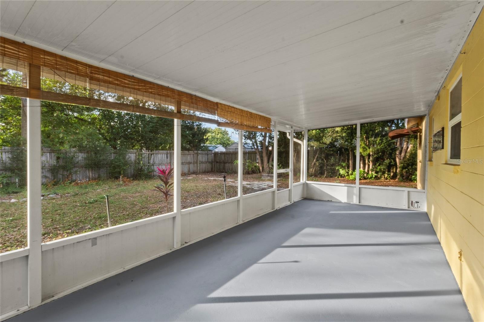Sunroom / Florida Room – Light-filled bonus room with backyard views and access to the kitchen—perfect for a home office, playroom, or lounge.