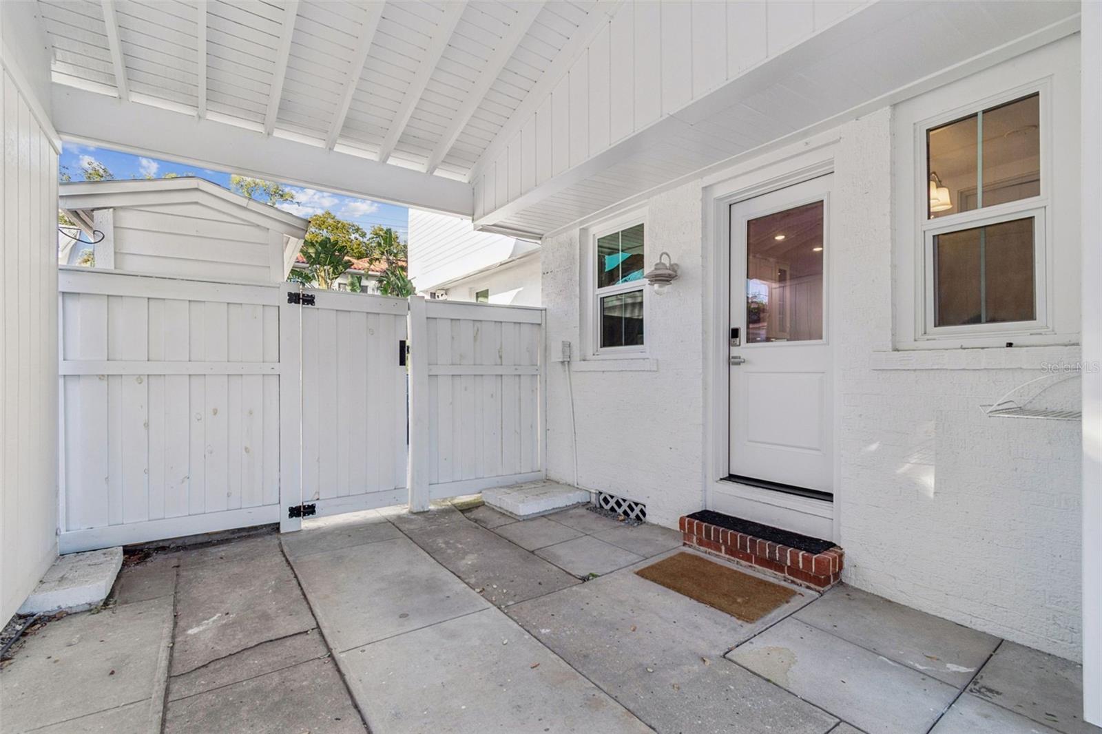 Carport for 1 car.  Room for up to 2 more cars behind it.