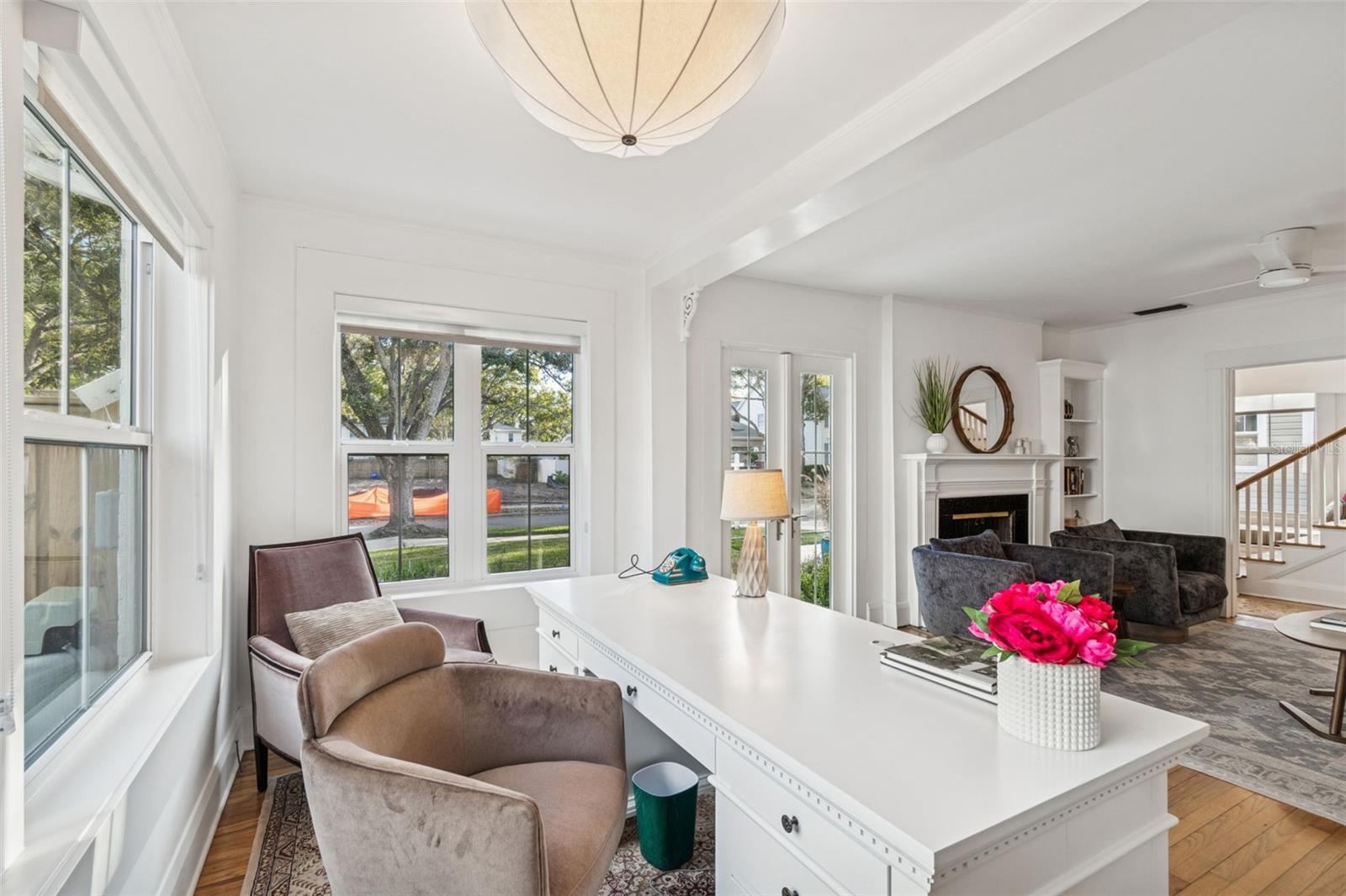 Living room is large enough for an office or additional eating area.