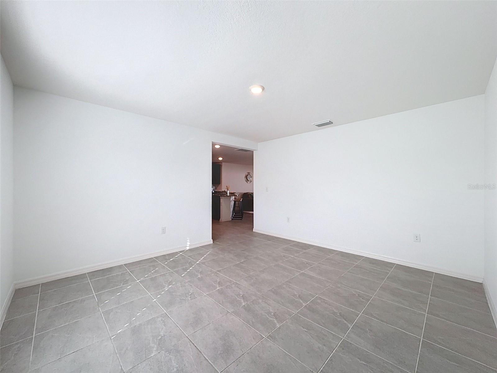 DINING ROOM HAS TILE FLOORING