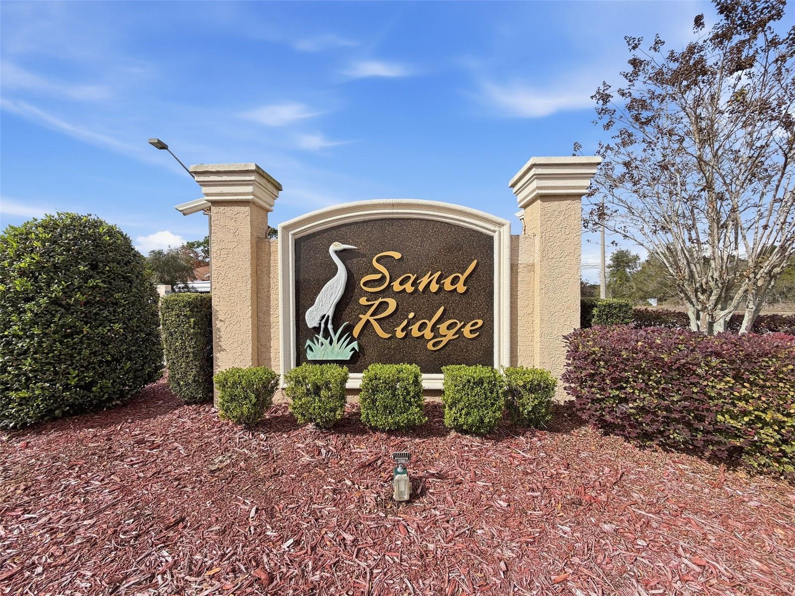 SAND RIDGE COMMUNITY SIGN.