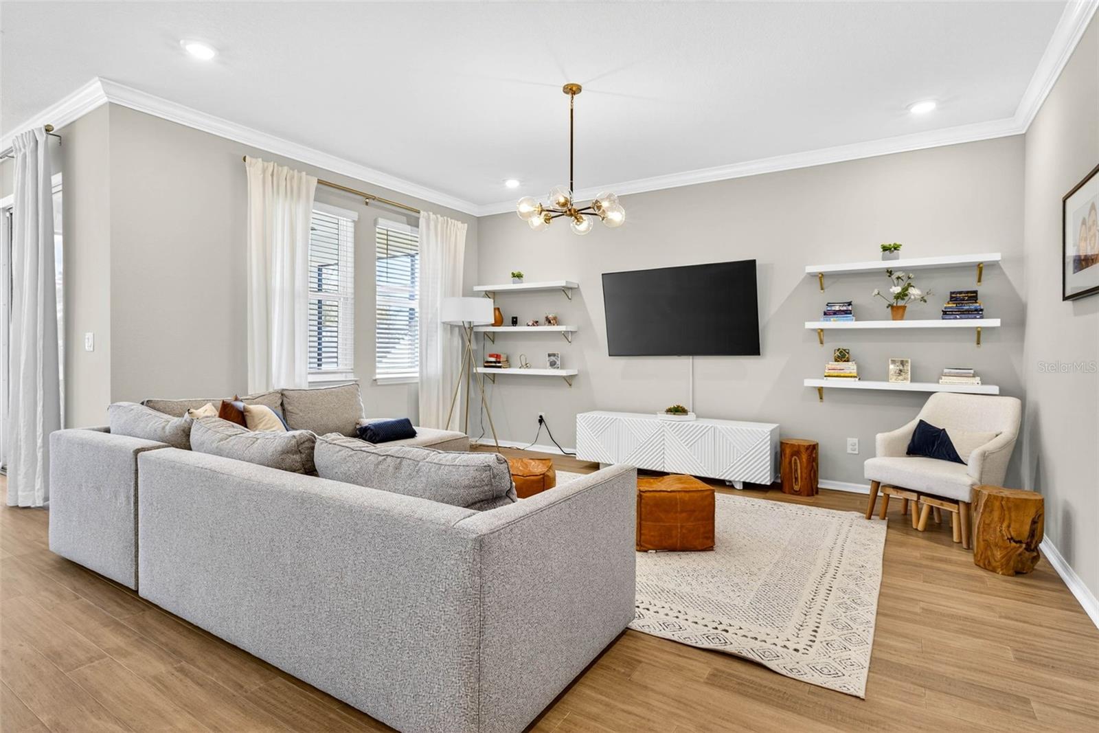 Living room with overhead lighting.