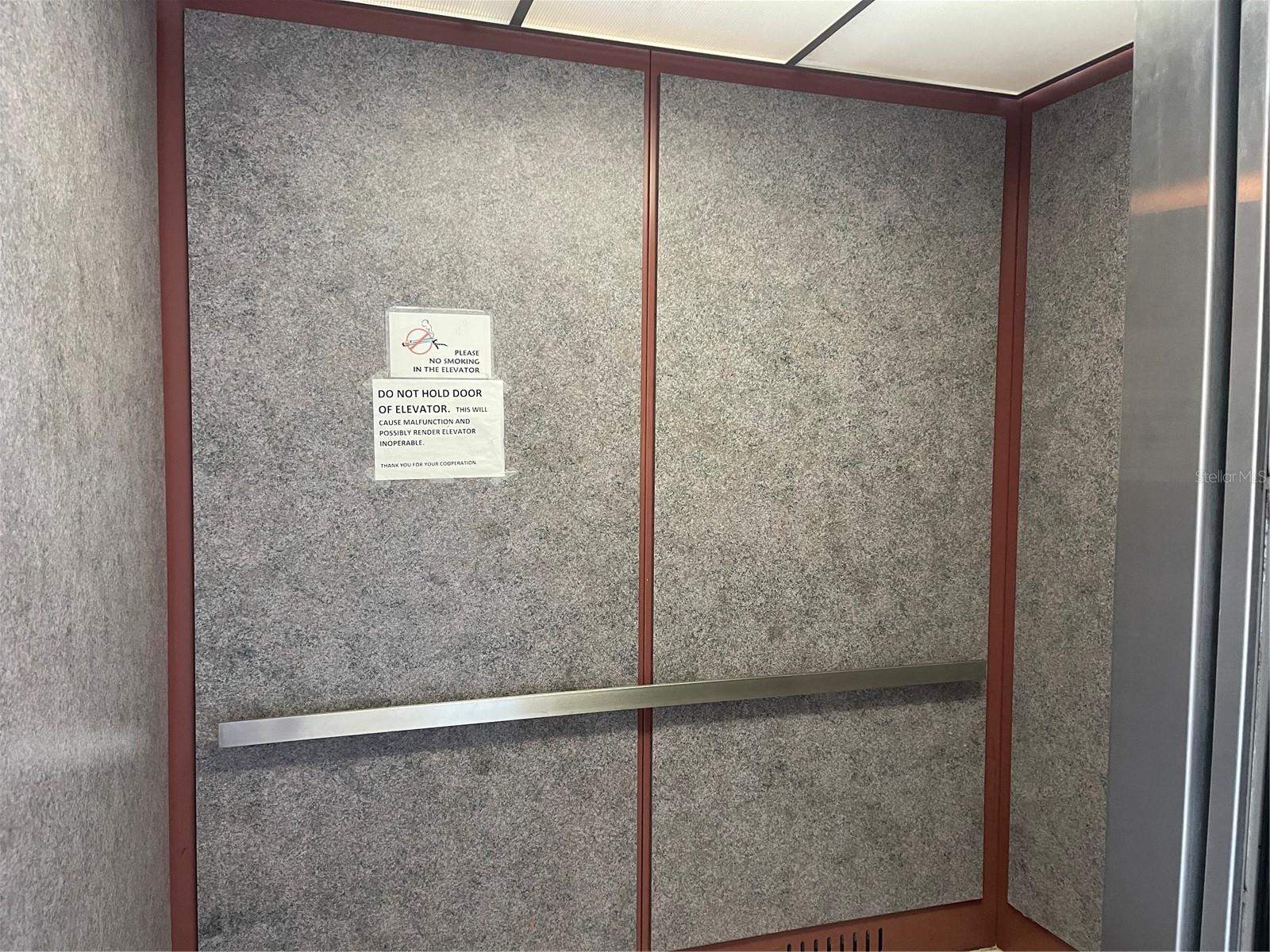 Elevator at center of building. Two sets of stairs at both ends of building too.