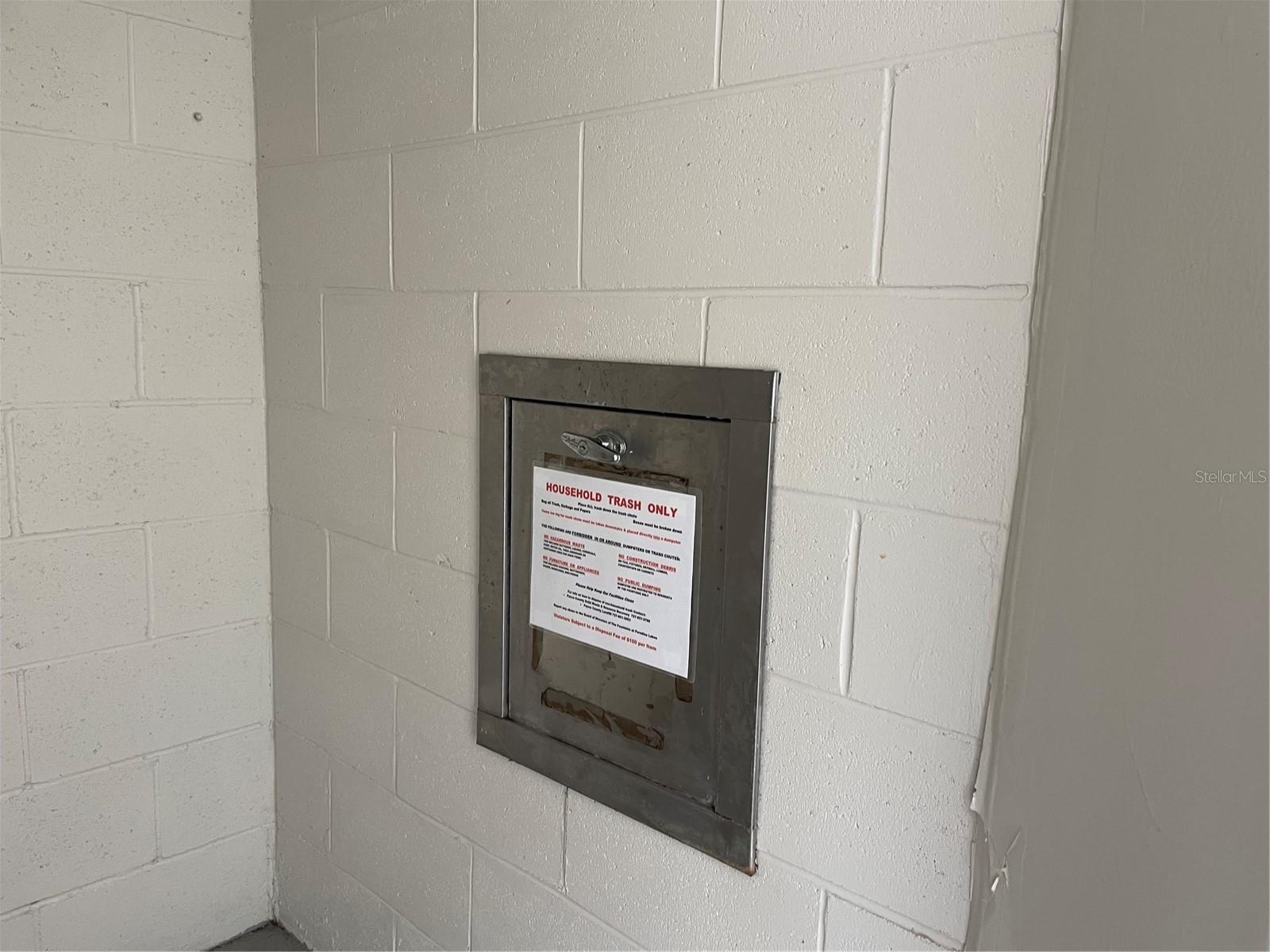 Garbage shoot is less than 50 ft from condo