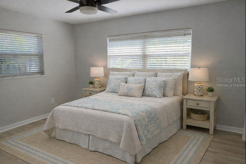 Third third bedroom is also spacious with lovely vinyl flooring.  (Photo has been virtually staged to illustrate the potential use of the space).