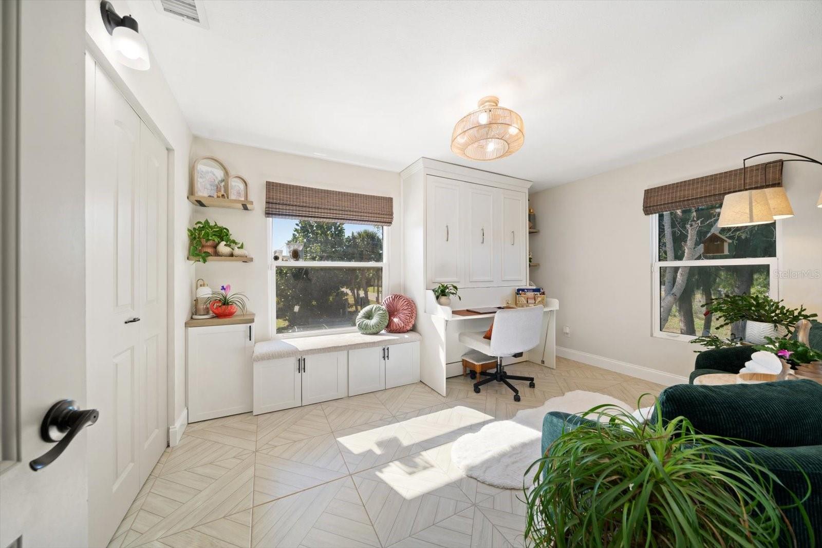 The large second bedroom- Great office, extra sitting room and perfect for occasional guest with an easy to use, comfortable Murphy bed!