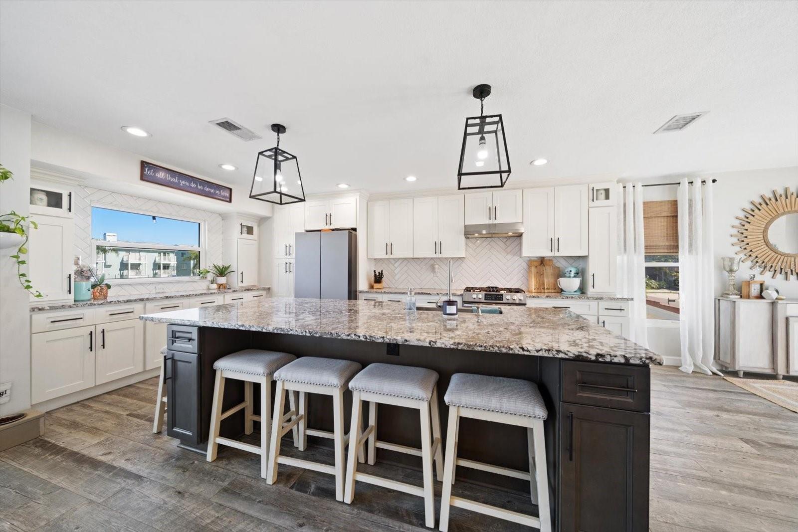 The oversized island is perfect to cook up some fun!