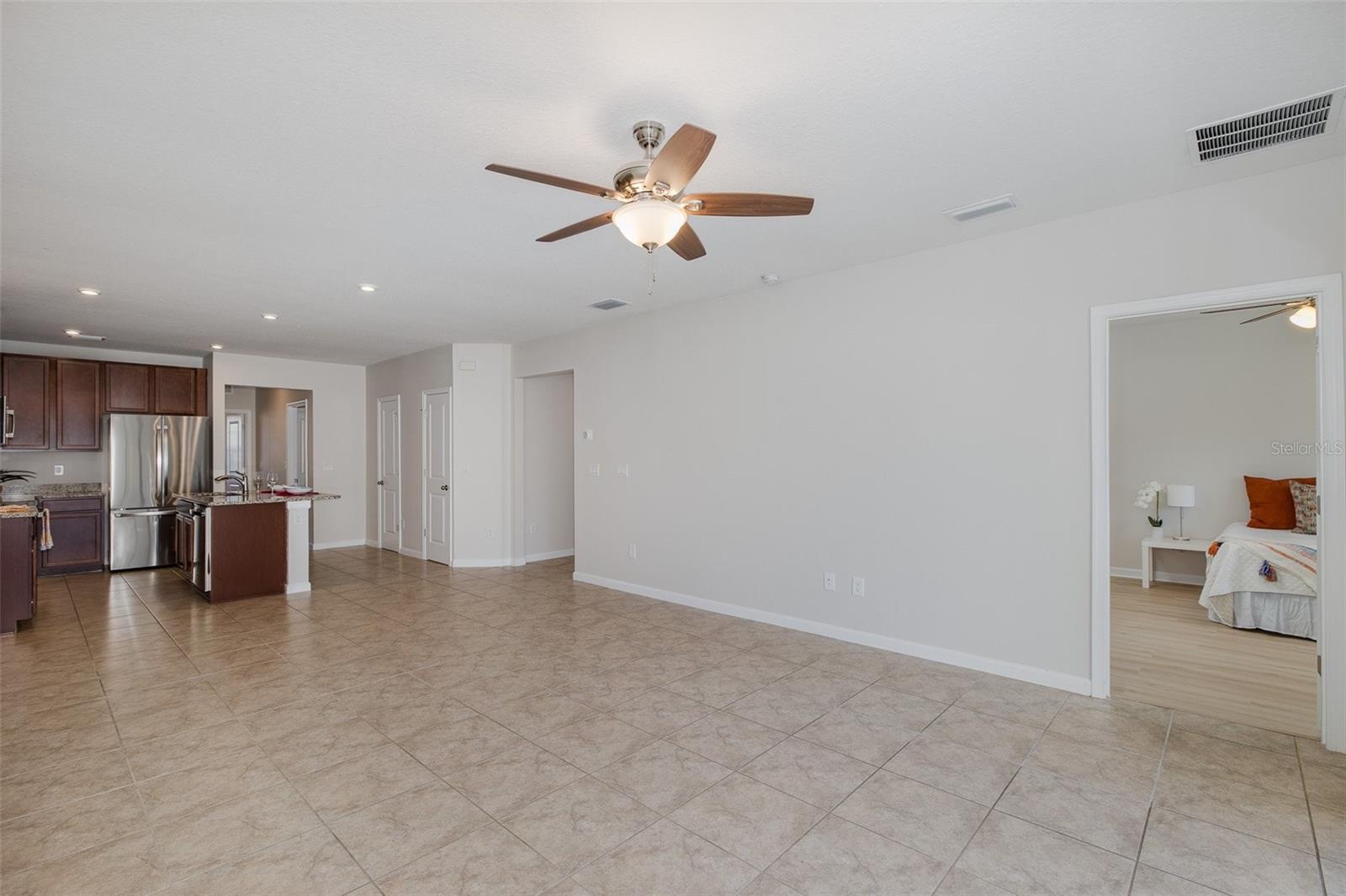 Family Room with view of kitchen and primary suite